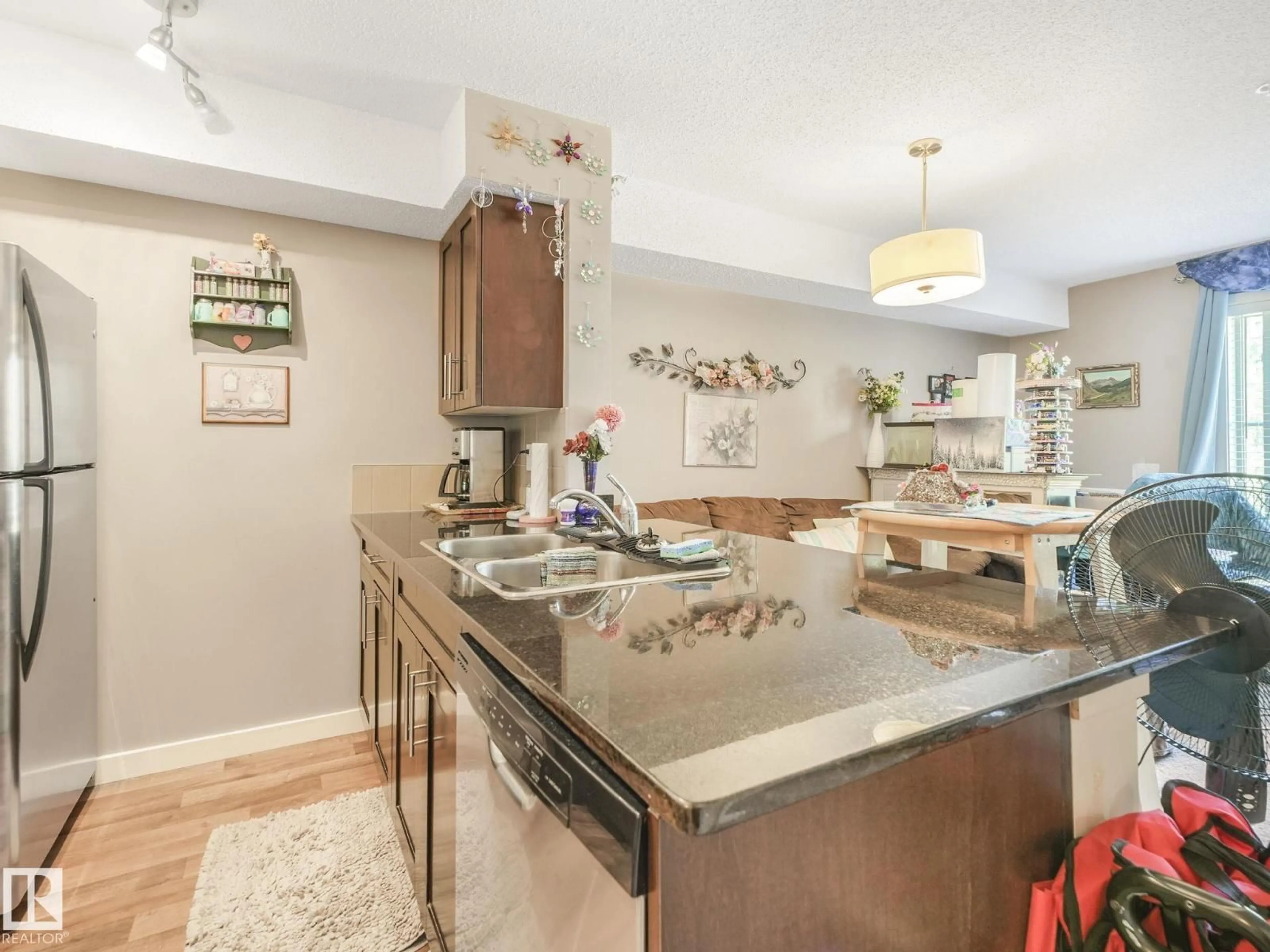 Open concept kitchen, ceramic/tile floor for 1070 - 210 MCCONACHIE BV, Edmonton Alberta T5Y0X1