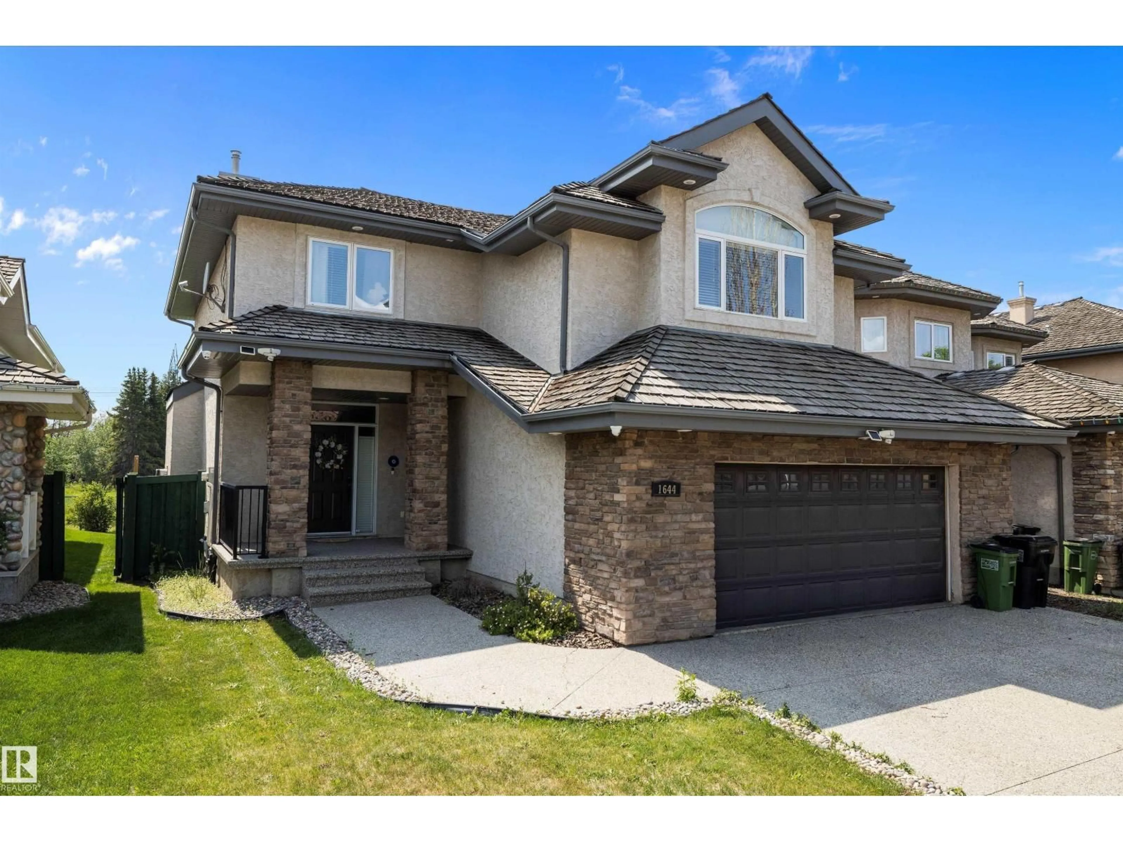 Home with brick exterior material, street for 1644 HECTOR RD, Edmonton Alberta T6R3G9