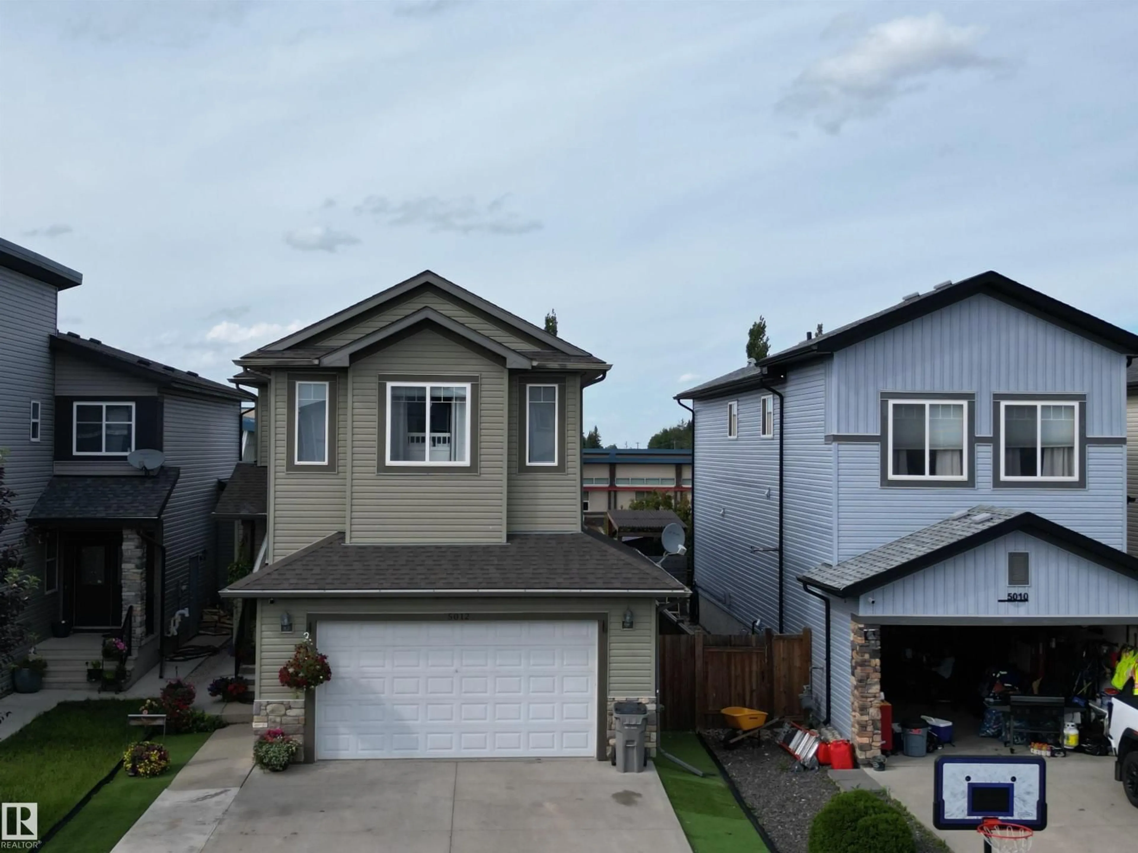 A pic from outside/outdoor area/front of a property/back of a property/a pic from drone, street for 5012 53 AV, Calmar Alberta T0C0V0
