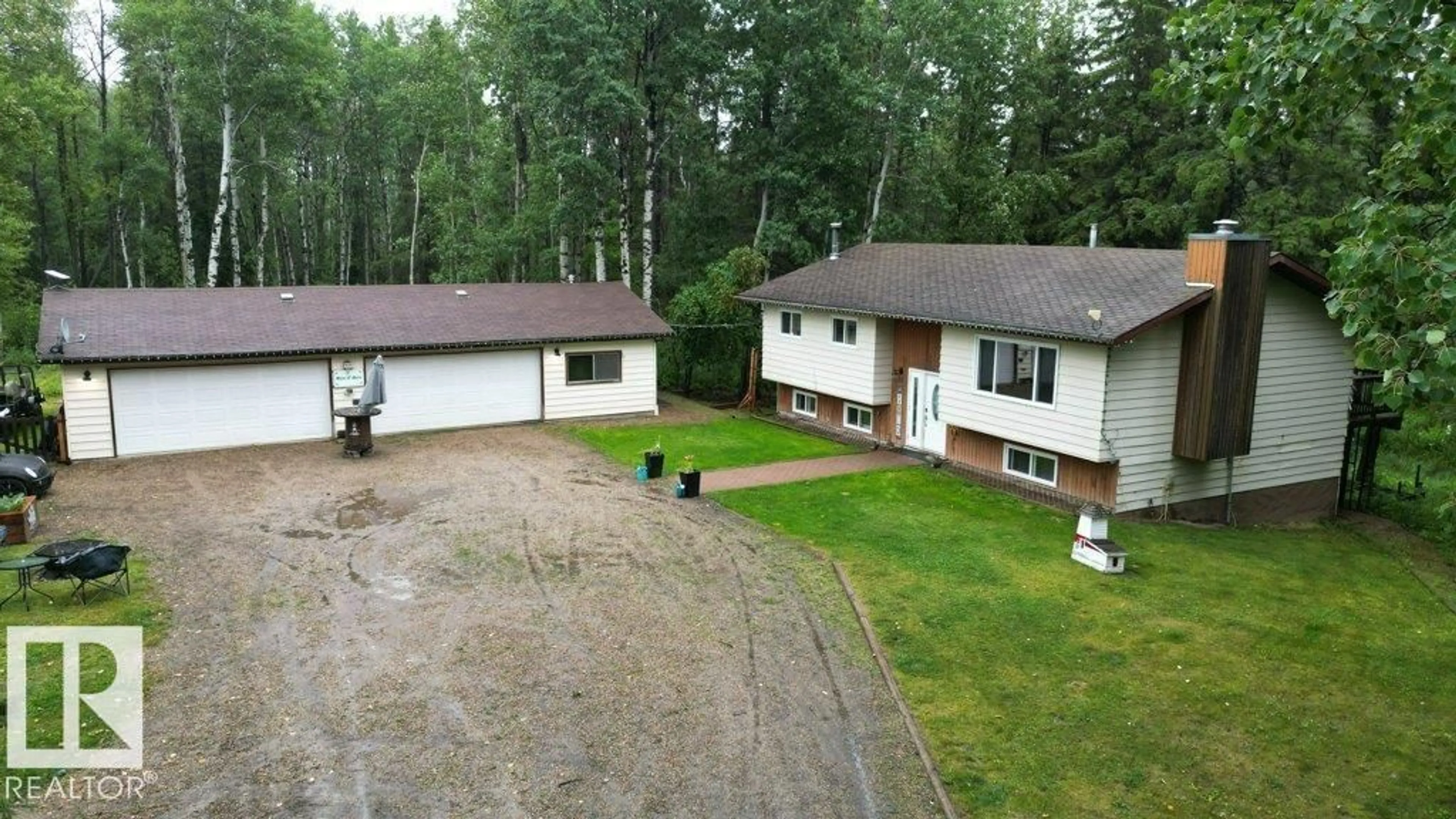 A pic from outside/outdoor area/front of a property/back of a property/a pic from drone, unknown for 32 2320 TWP ROAD 540, Rural Lac Ste. Anne County Alberta T0E1V0