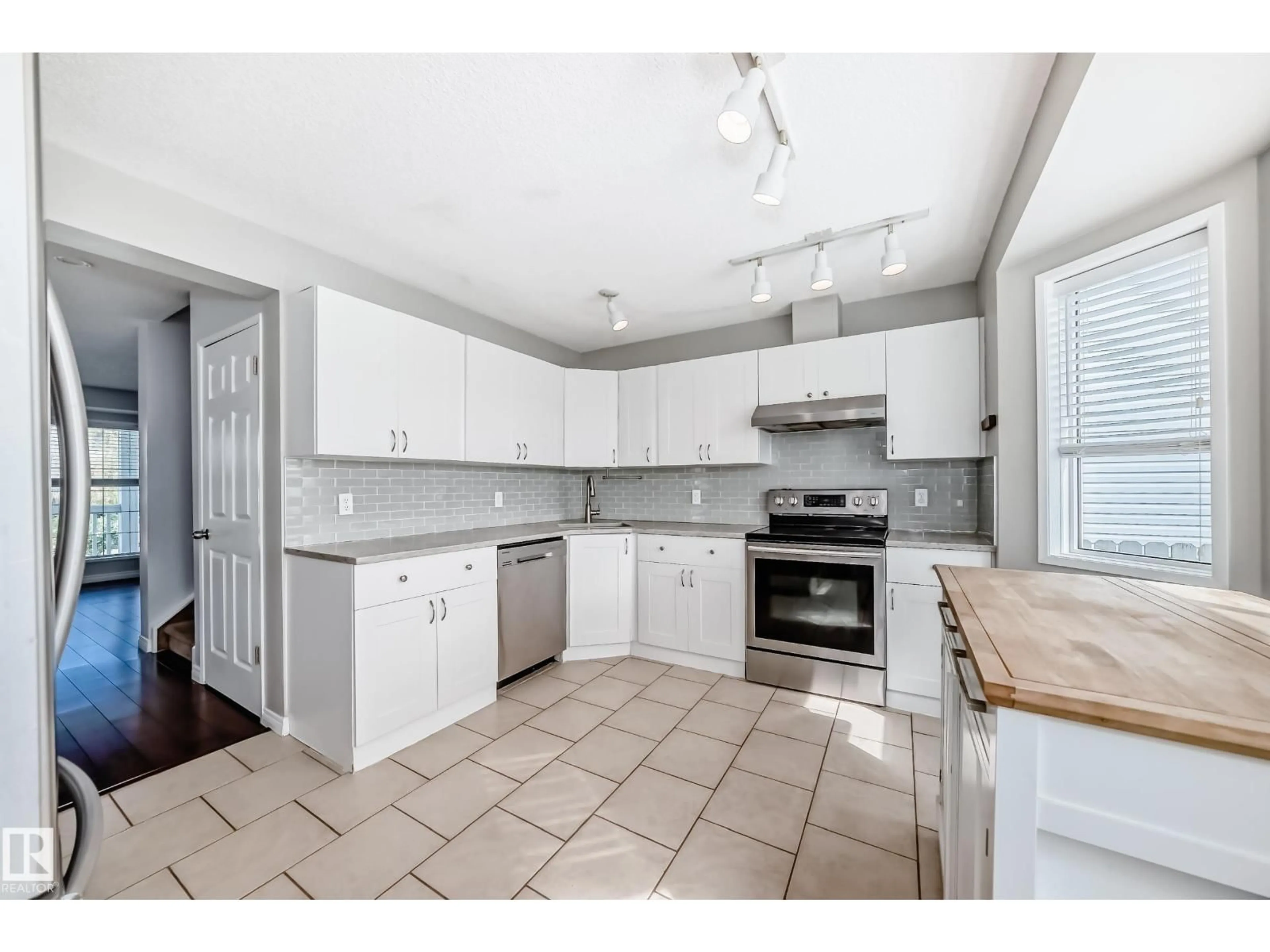 Open concept kitchen, unknown for 16217 57 ST, Edmonton Alberta T5Y2V3