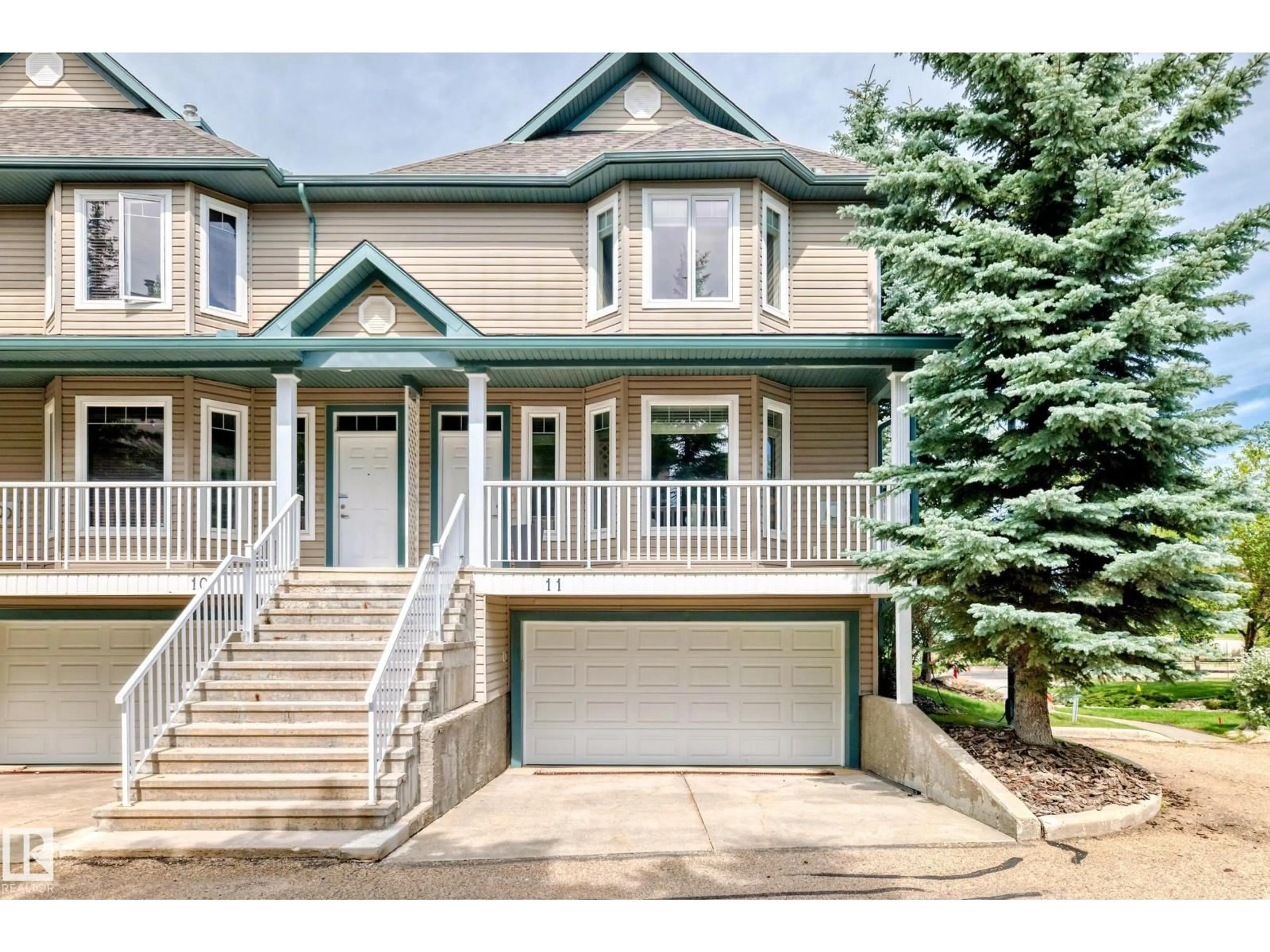 Home with vinyl exterior material, street for 903 - 11 RUTHERFORD RD SW, Edmonton Alberta T6W1N9