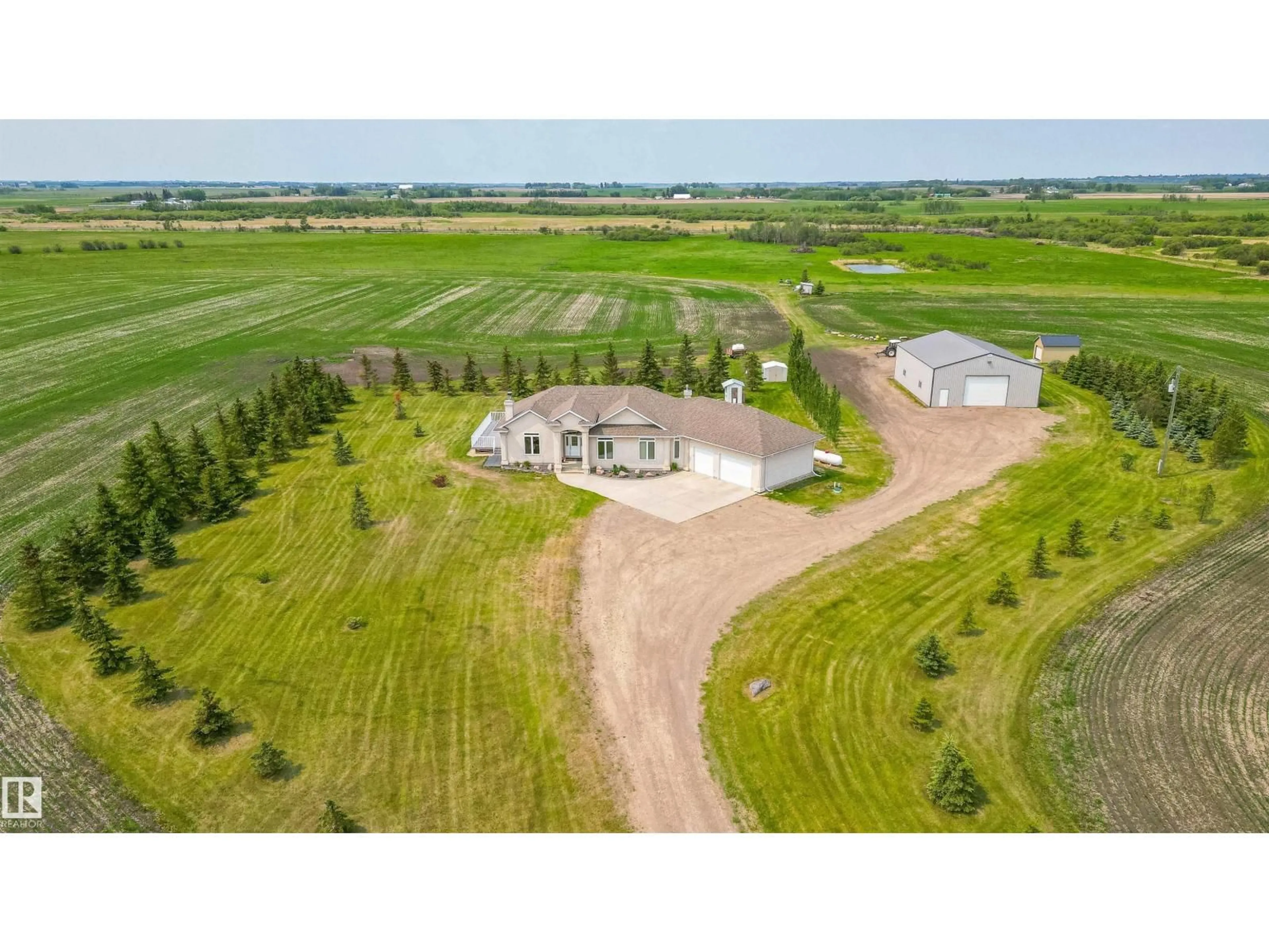 A pic from outside/outdoor area/front of a property/back of a property/a pic from drone, unknown for 55116 RGE RD 234, Rural Sturgeon County Alberta T8T2A7
