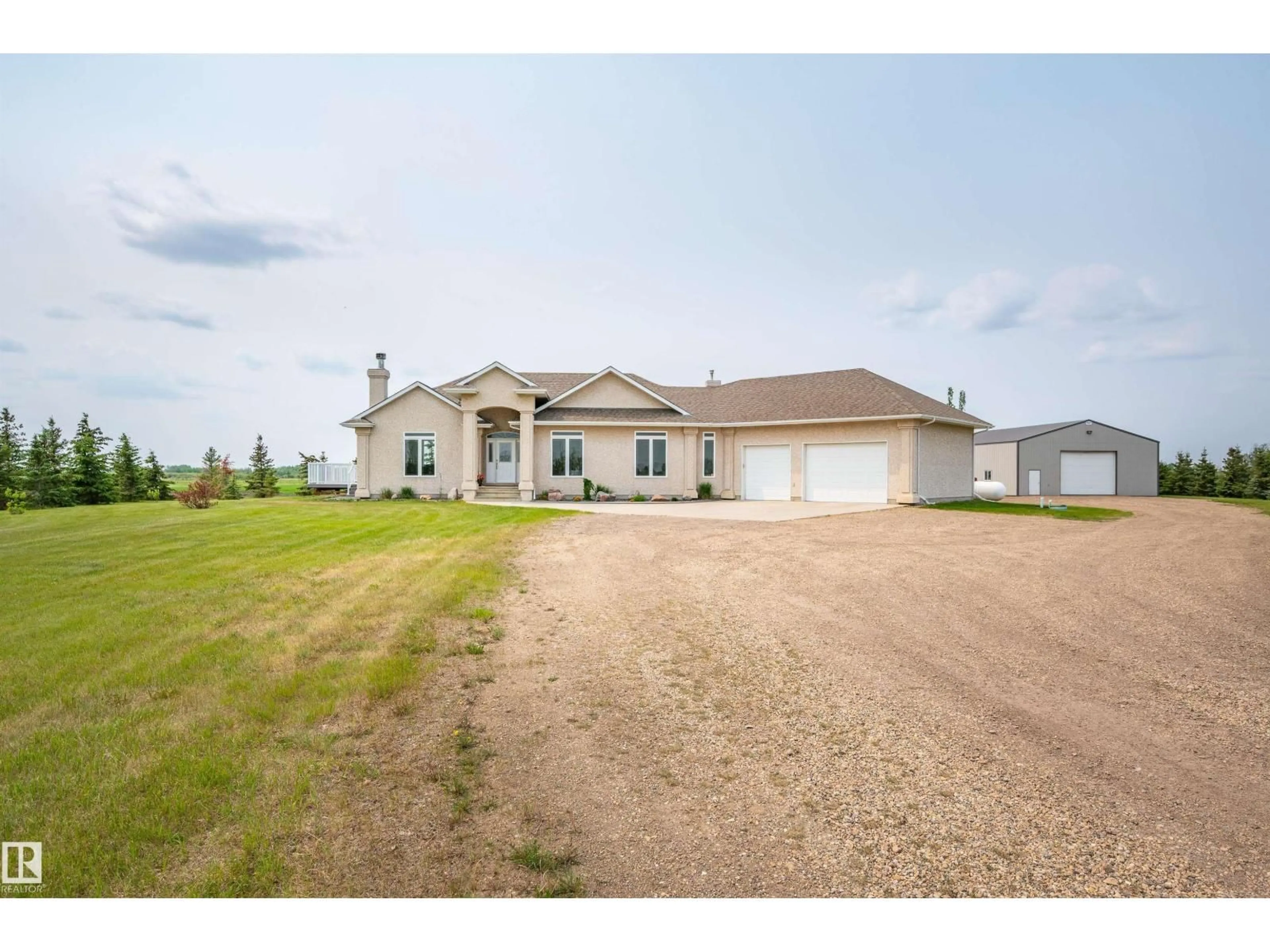 A pic from outside/outdoor area/front of a property/back of a property/a pic from drone, building for 55116 RGE RD 234, Rural Sturgeon County Alberta T8T2A7