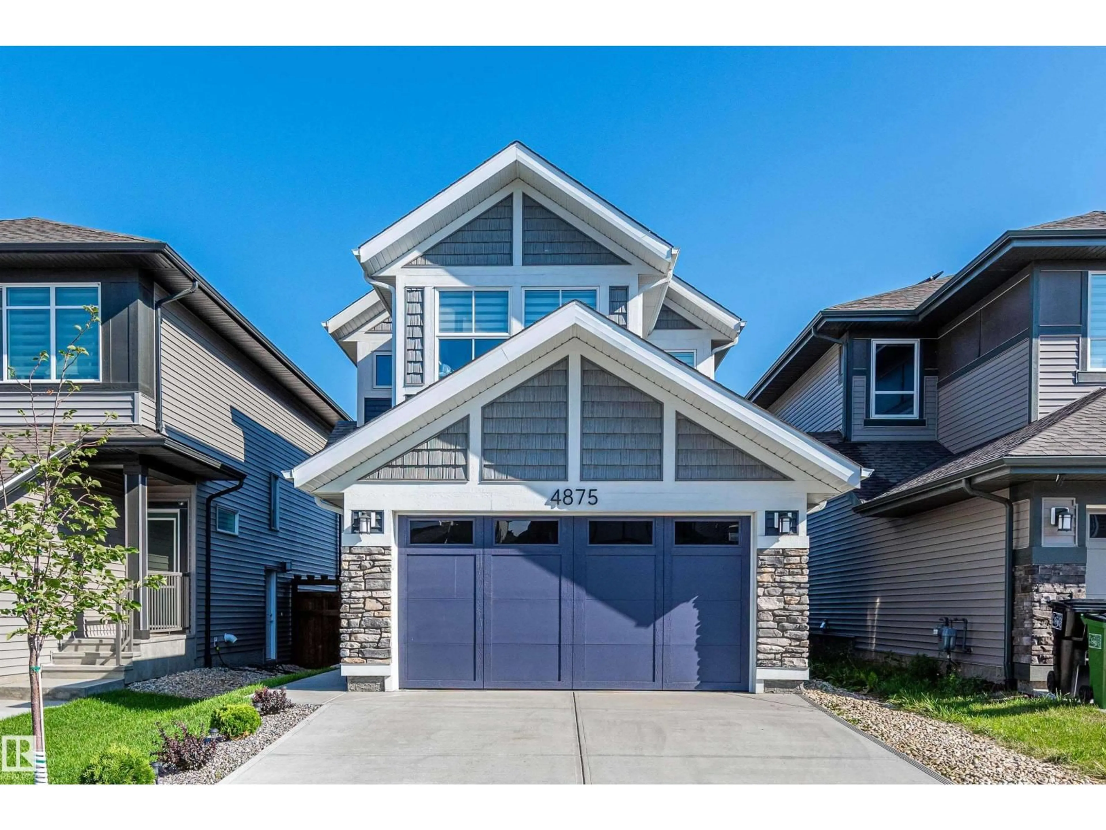 Home with vinyl exterior material, street for 4875 KINNEY RD, Edmonton Alberta T6W5G3