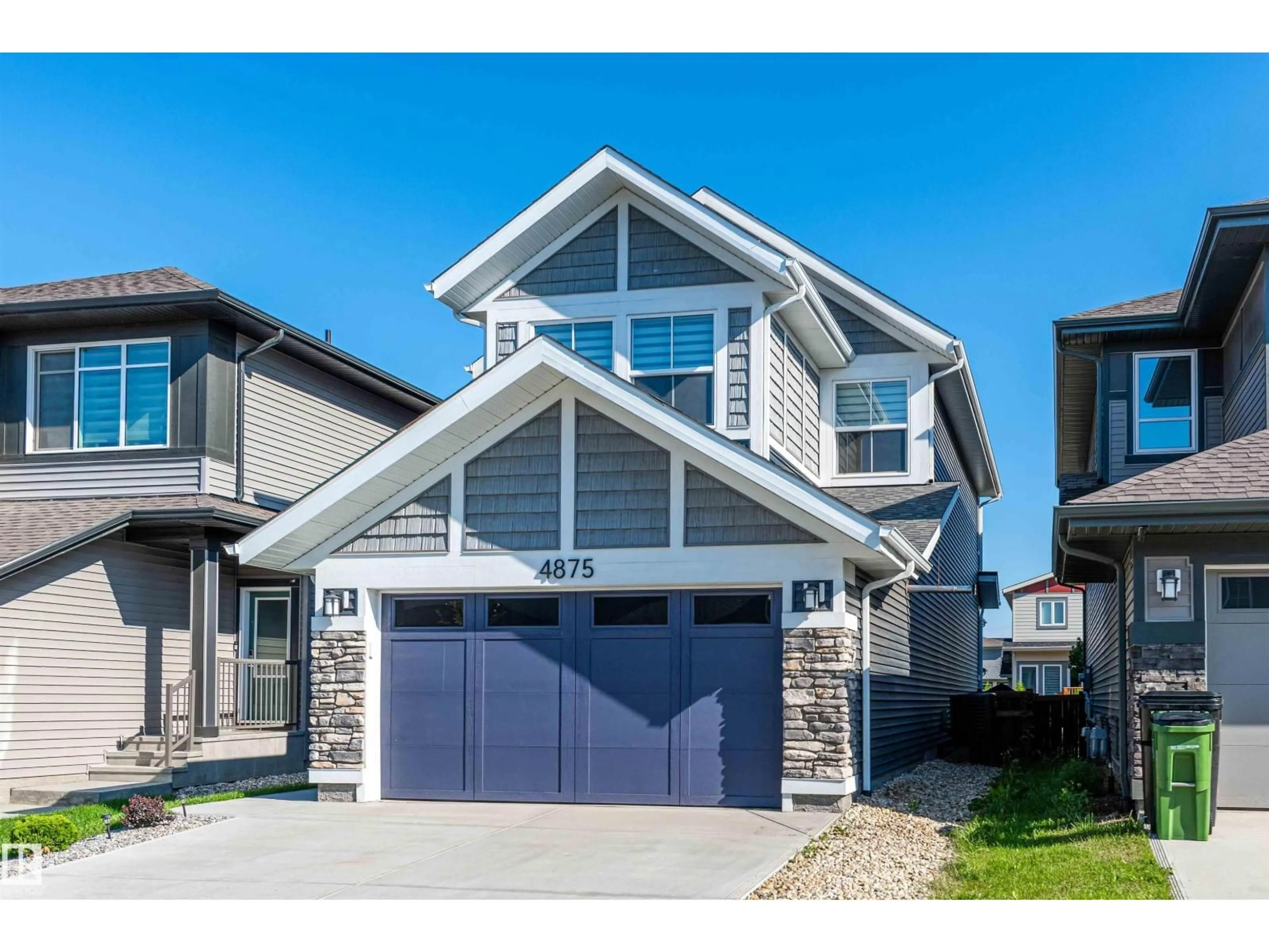 Home with vinyl exterior material, street for 4875 KINNEY RD, Edmonton Alberta T6W5G3