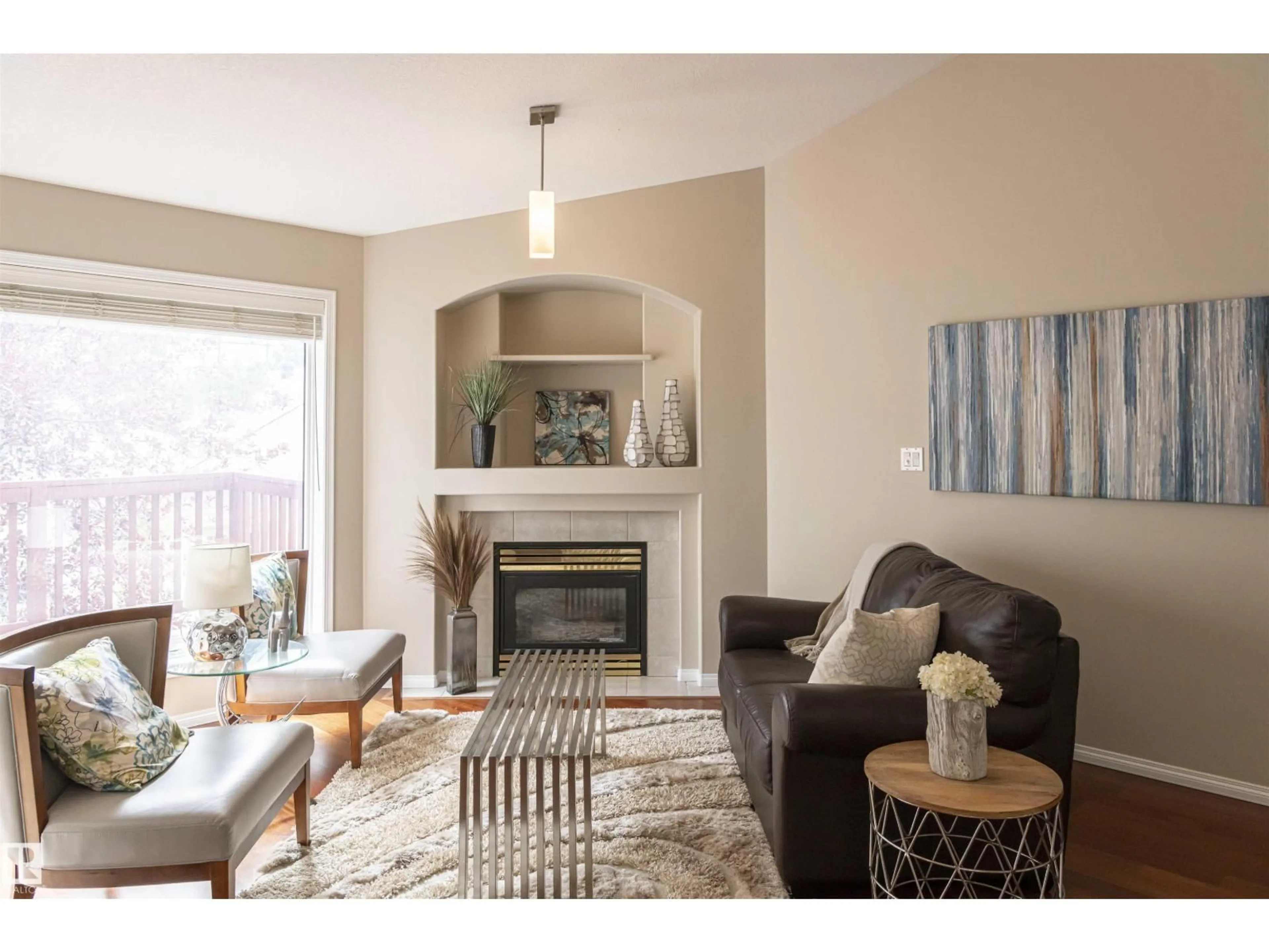 Living room with furniture, wood/laminate floor for #6 - 1203 CARTER CREST RD, Edmonton Alberta T6R2R1