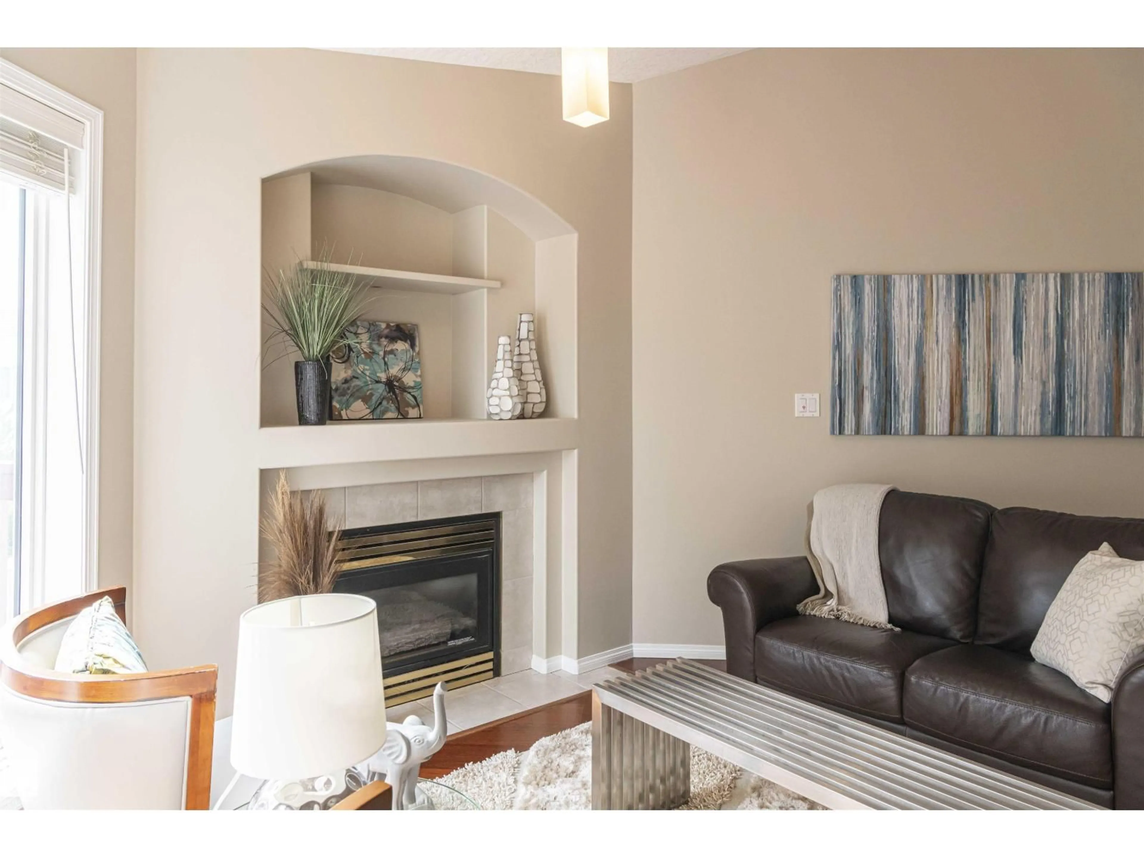 Living room with furniture, wood/laminate floor for #6 - 1203 CARTER CREST RD, Edmonton Alberta T6R2R1