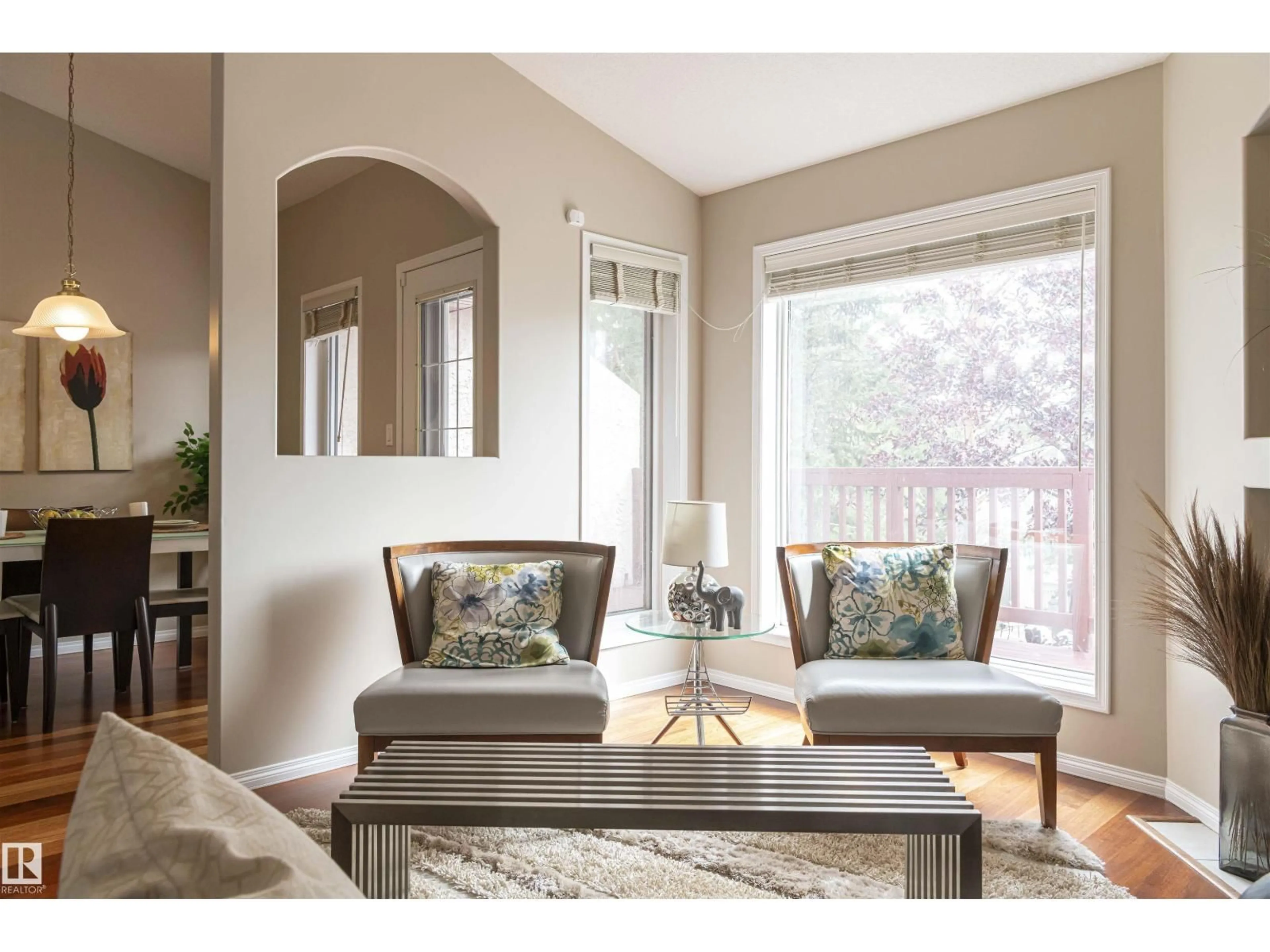 Living room with furniture, wood/laminate floor for #6 - 1203 CARTER CREST RD, Edmonton Alberta T6R2R1