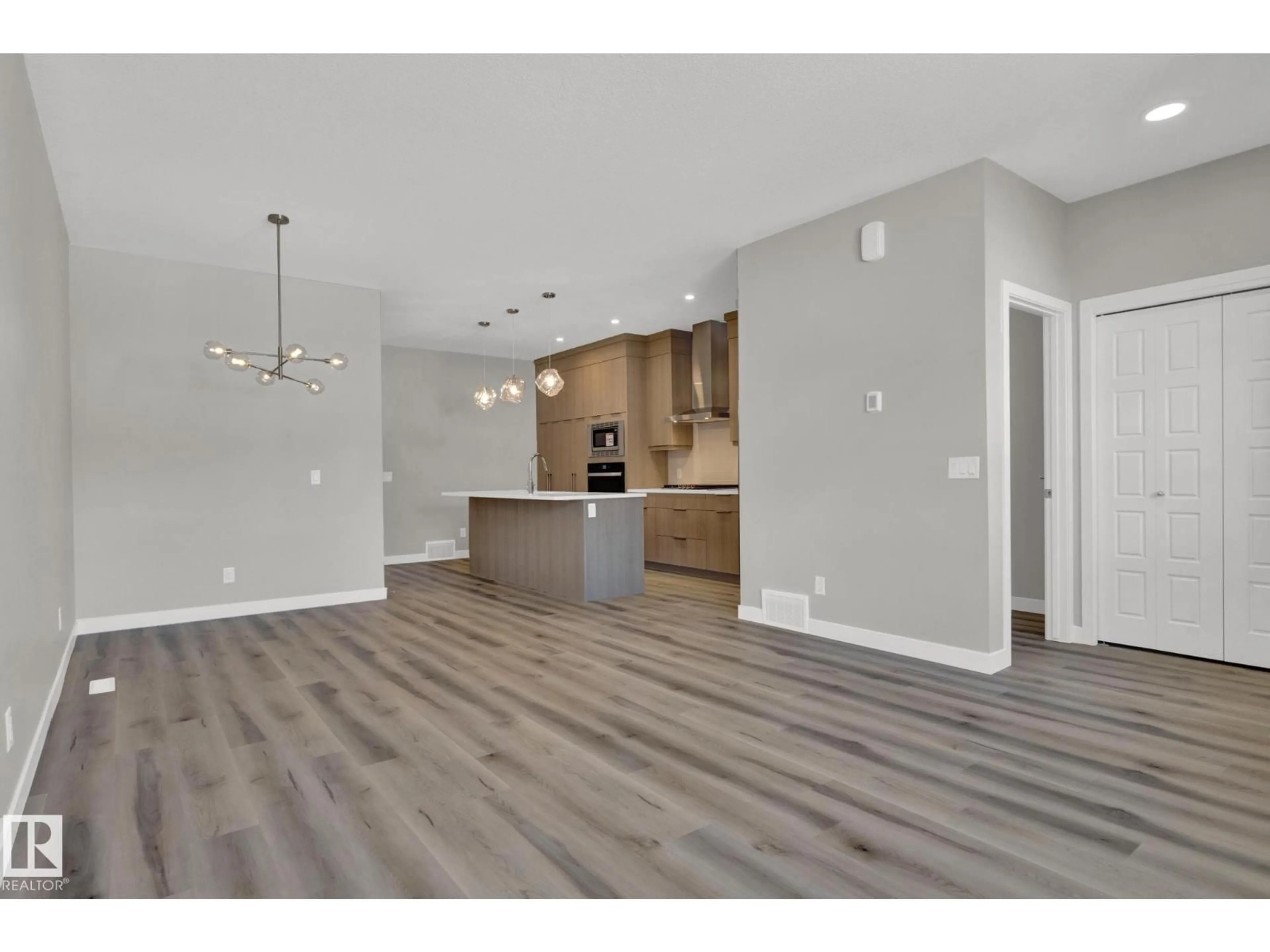Open concept kitchen, wood/laminate floor for NW - 3375 ERLANGER BEND BN, Edmonton Alberta T6M3A6