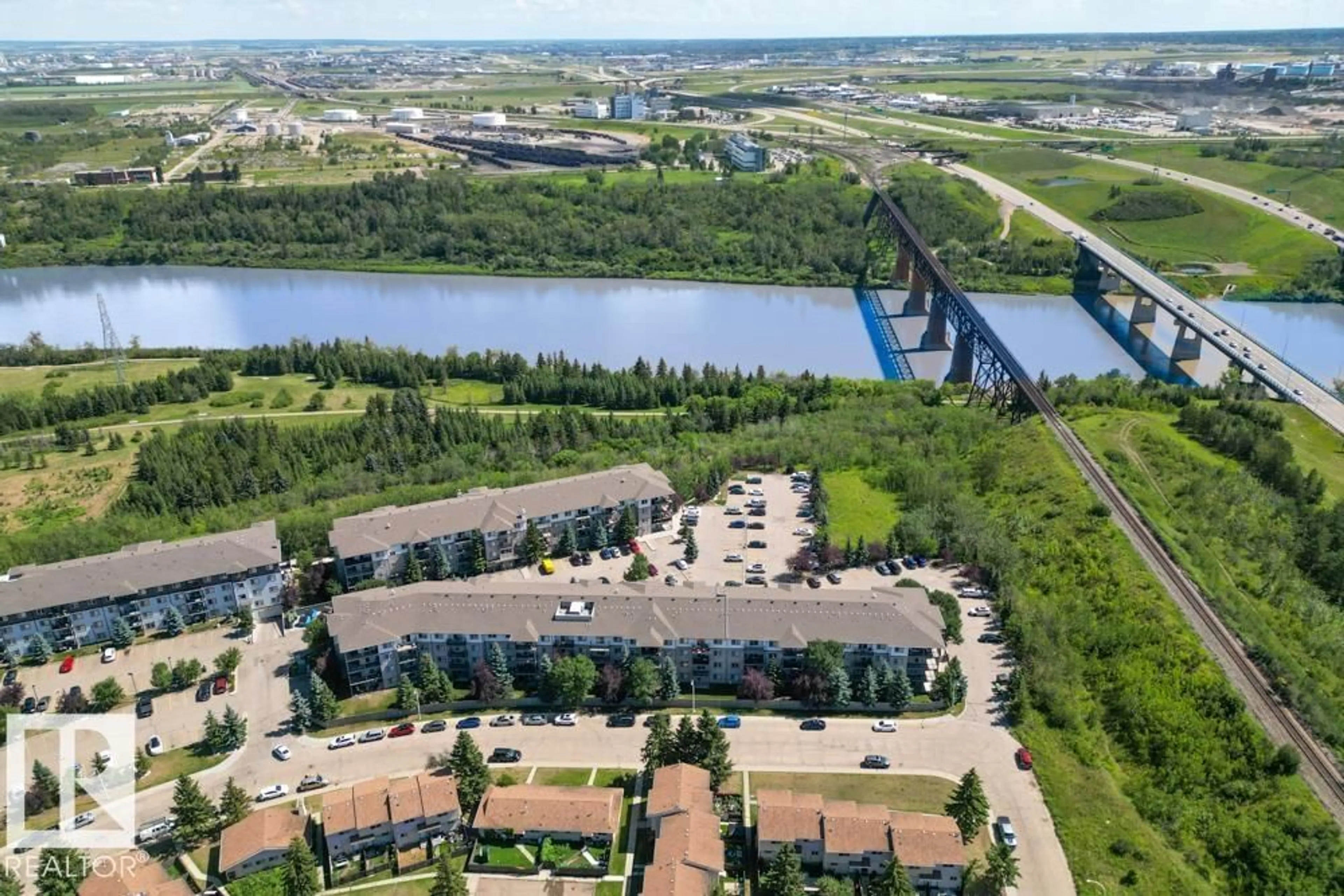 A pic from outside/outdoor area/front of a property/back of a property/a pic from drone, water/lake/river/ocean view for #424 - 1180 HYNDMAN ROAD, Edmonton Alberta T5A0P8