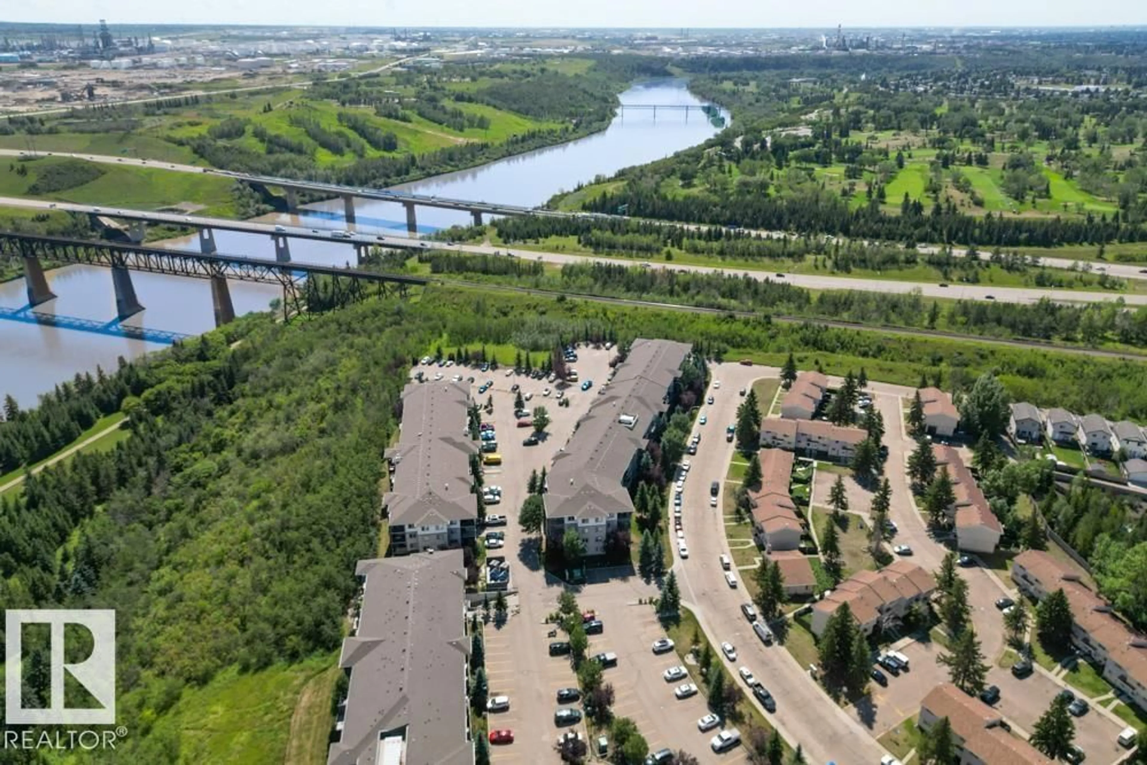 A pic from outside/outdoor area/front of a property/back of a property/a pic from drone, water/lake/river/ocean view for #424 - 1180 HYNDMAN ROAD, Edmonton Alberta T5A0P8