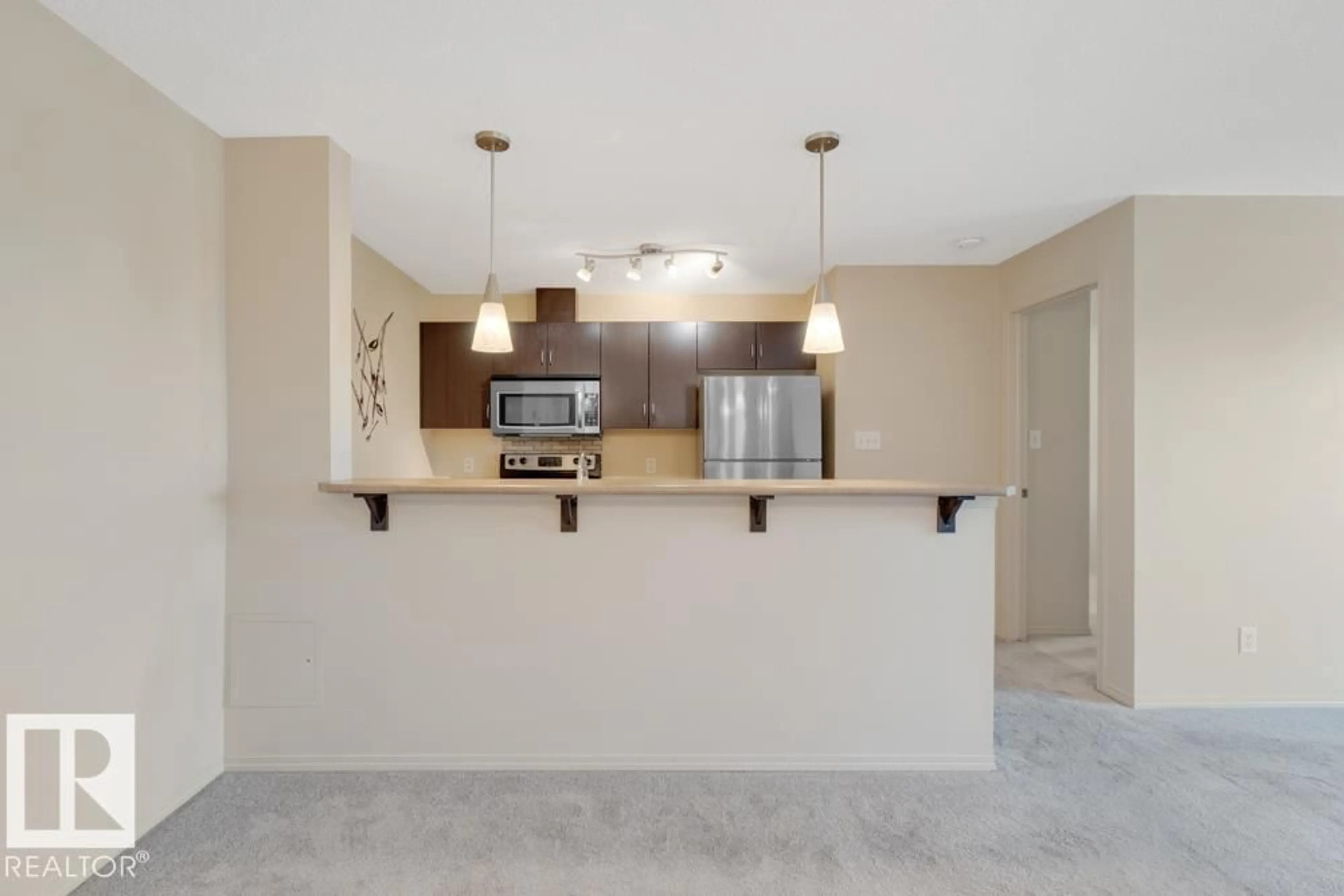 Open concept kitchen, unknown for #424 - 1180 HYNDMAN ROAD, Edmonton Alberta T5A0P8