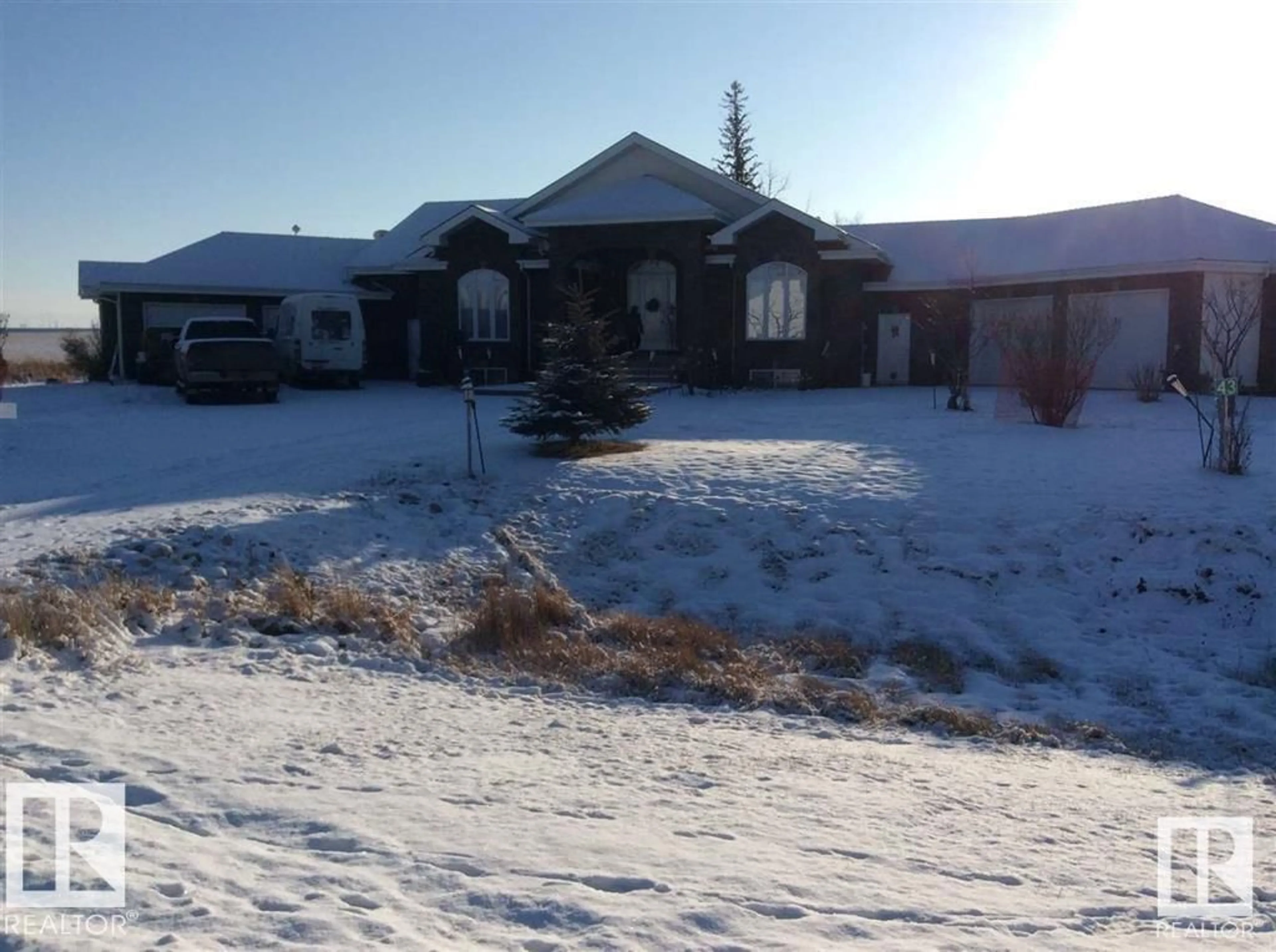 A pic from outside/outdoor area/front of a property/back of a property/a pic from drone, street for #43 - 26323 TWP ROAD 532 A, Rural Parkland County Alberta T7X4M1