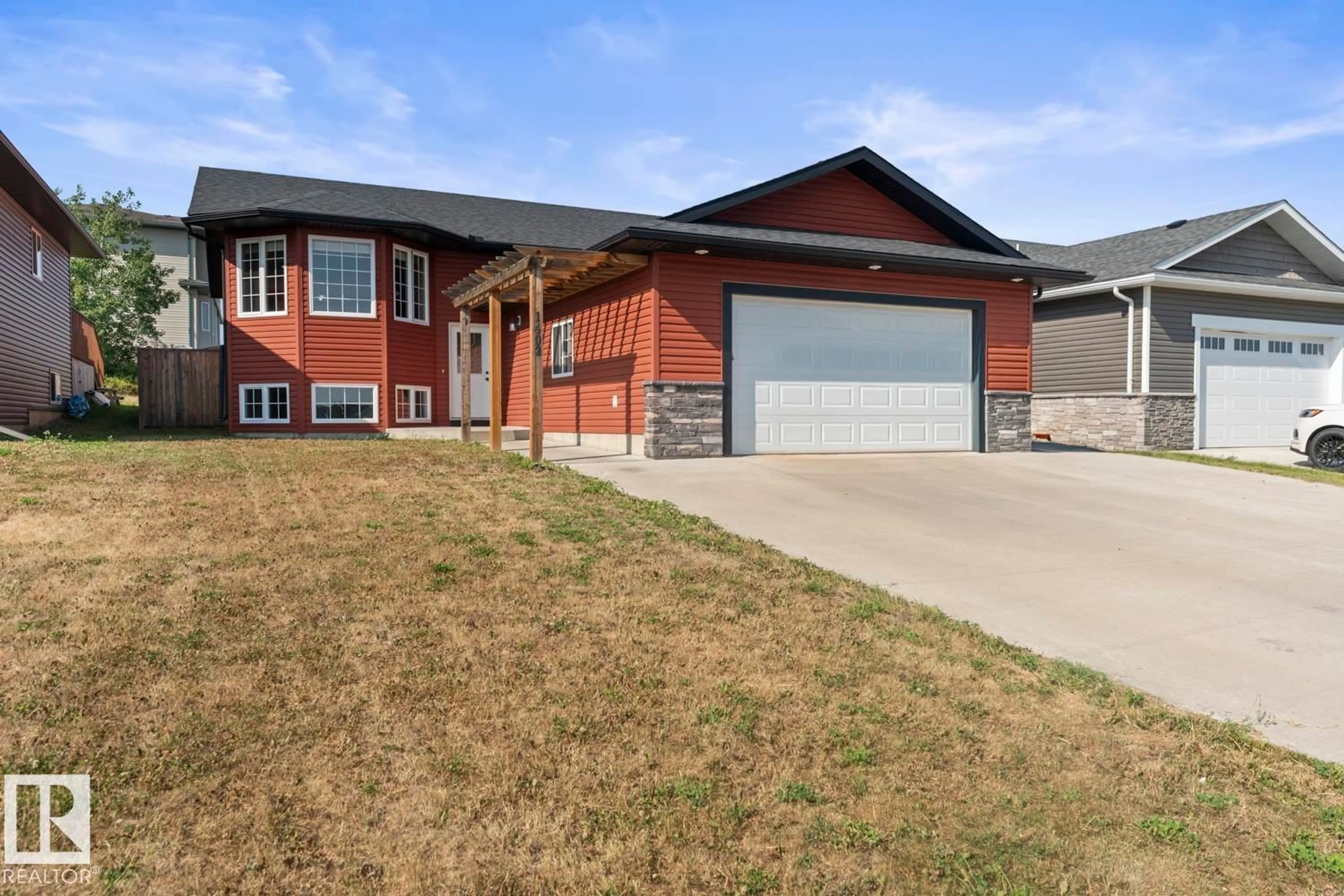 Home with brick exterior material, street for 1402 13 AV, Cold Lake Alberta T9M2E1