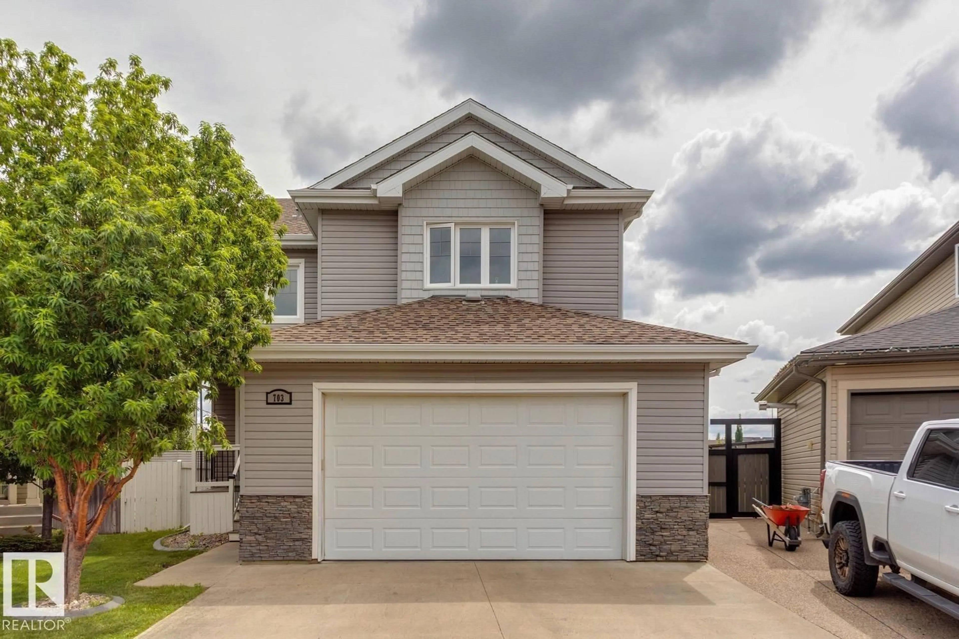 Home with vinyl exterior material, street for 703 SUNCREST POINT, Sherwood Park Alberta T8H0G6