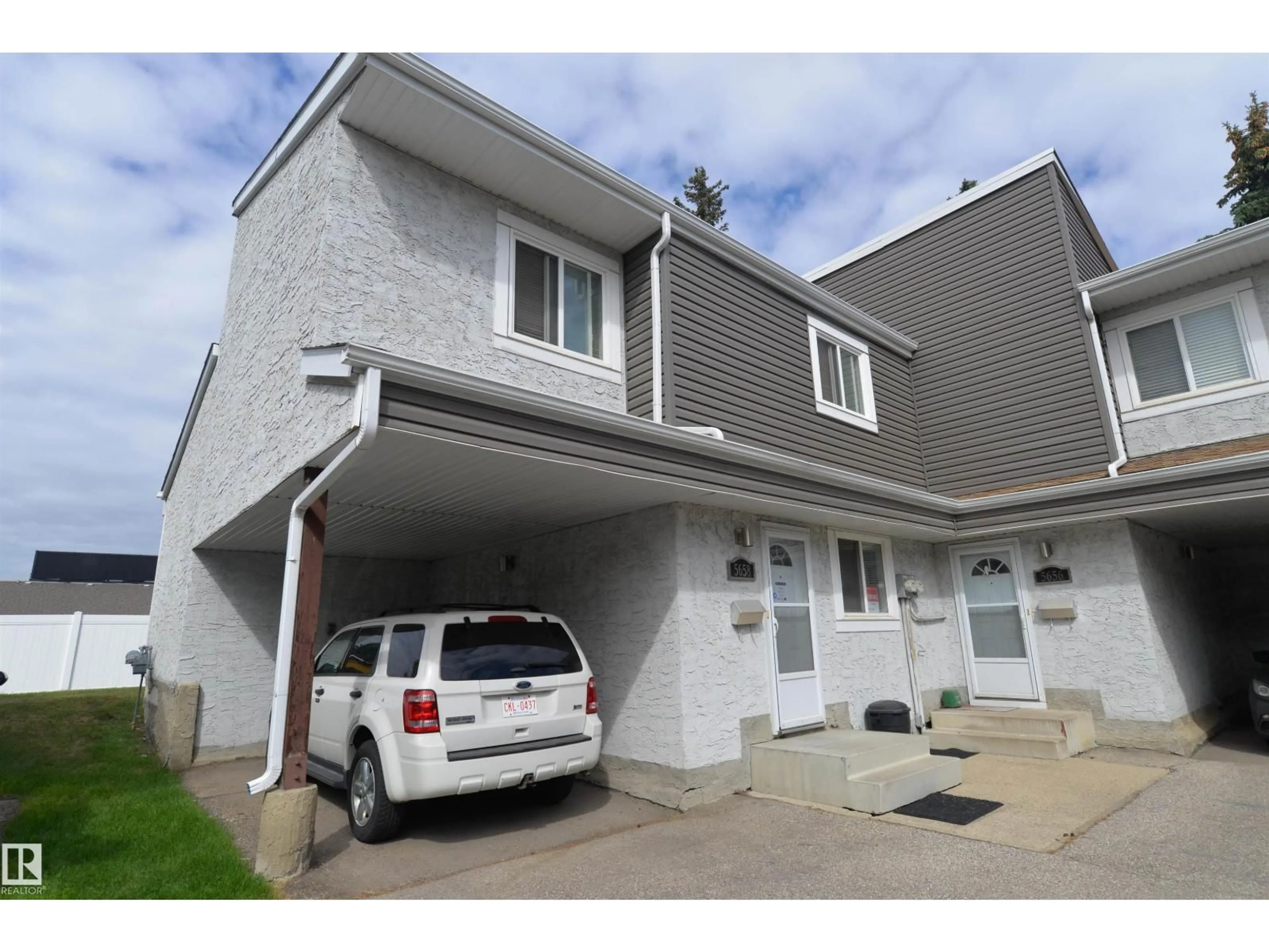 Home with vinyl exterior material, street for 5658 19A AV, Edmonton Alberta T6L2B9