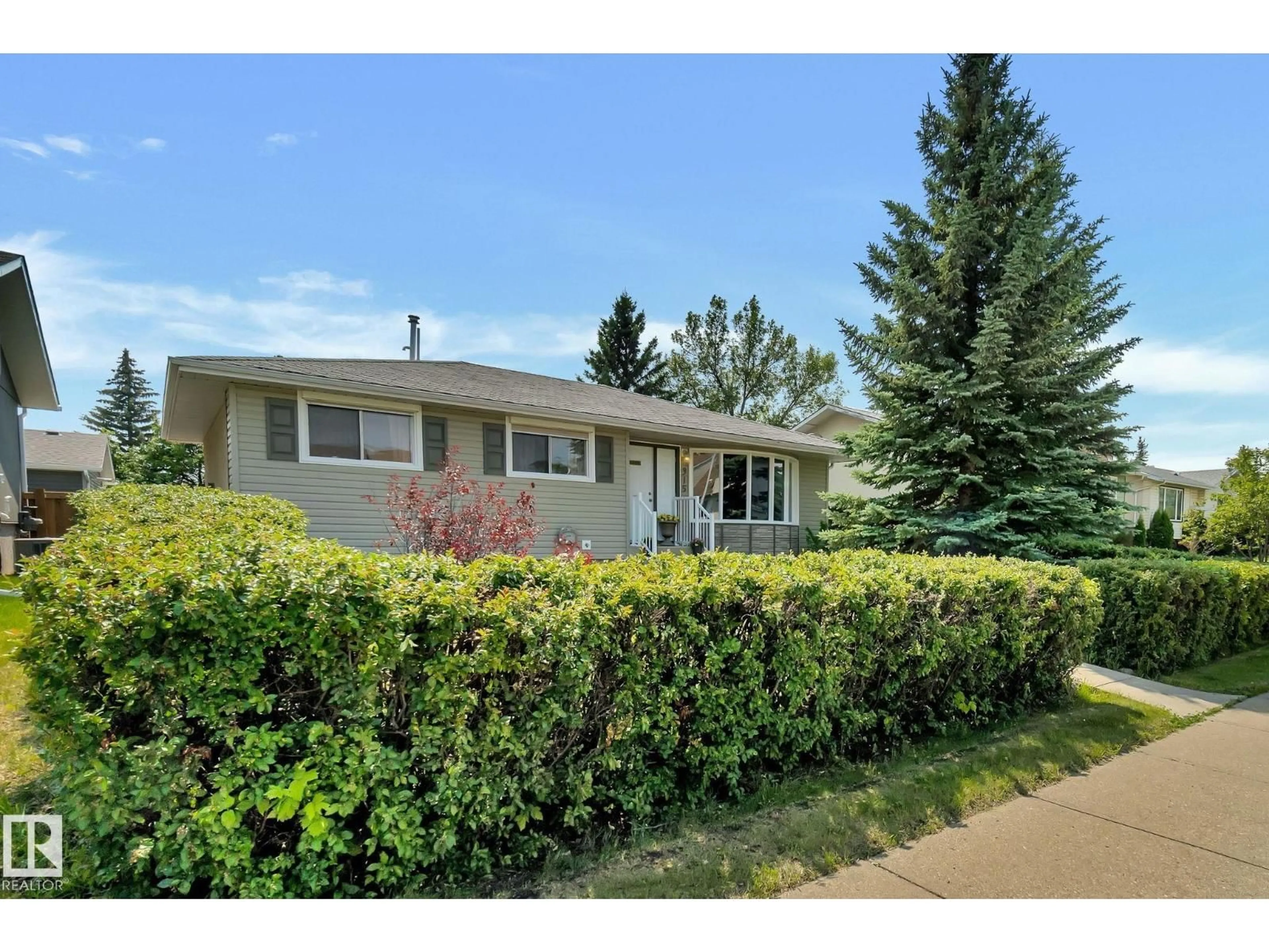 Home with vinyl exterior material, street for 315 KNOTTWOOD ROAD NORTH NW, Edmonton Alberta T6K2G5