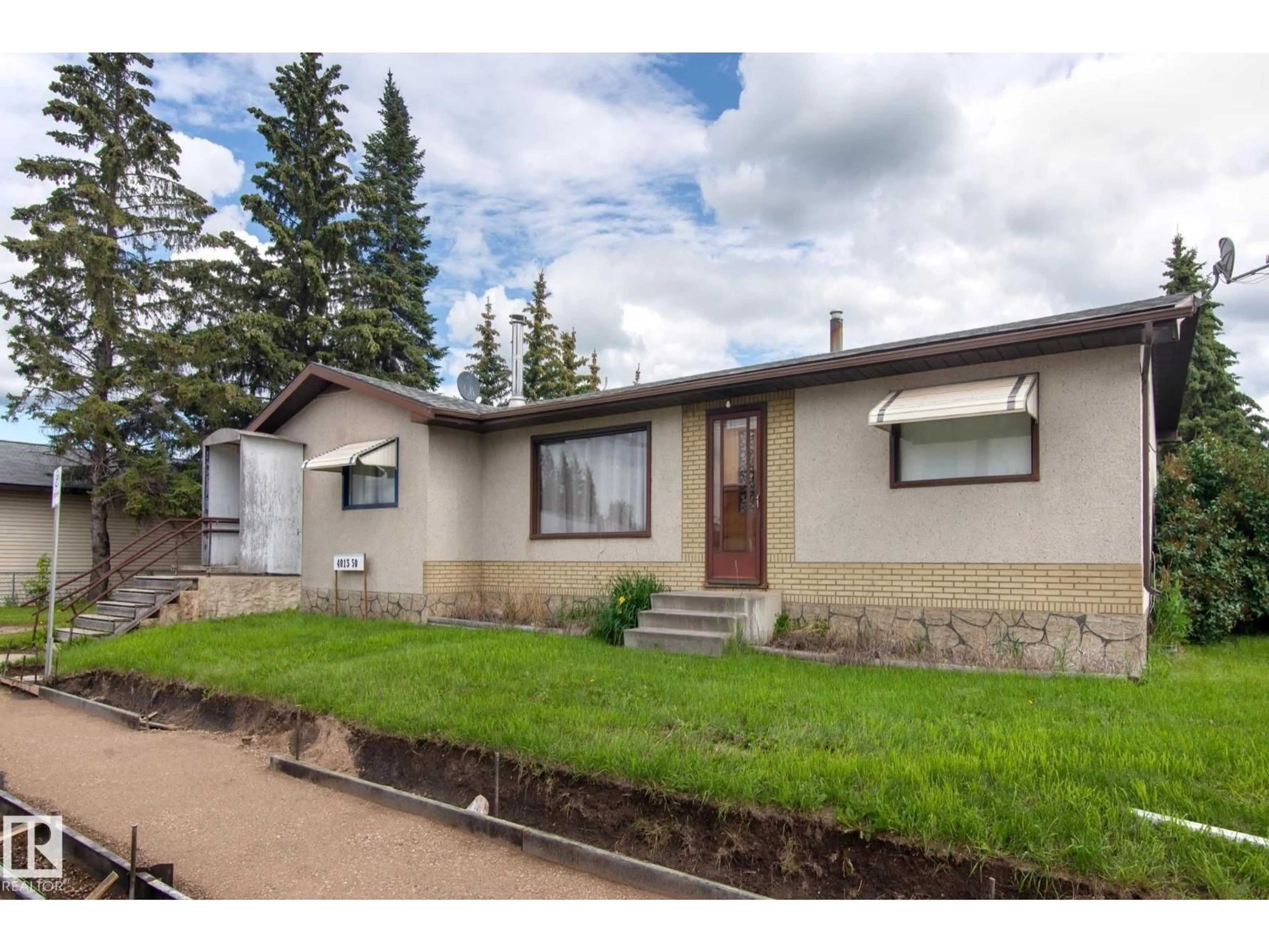 Home with vinyl exterior material, street for 4813 50 ST, Ardmore Alberta T0A0B0