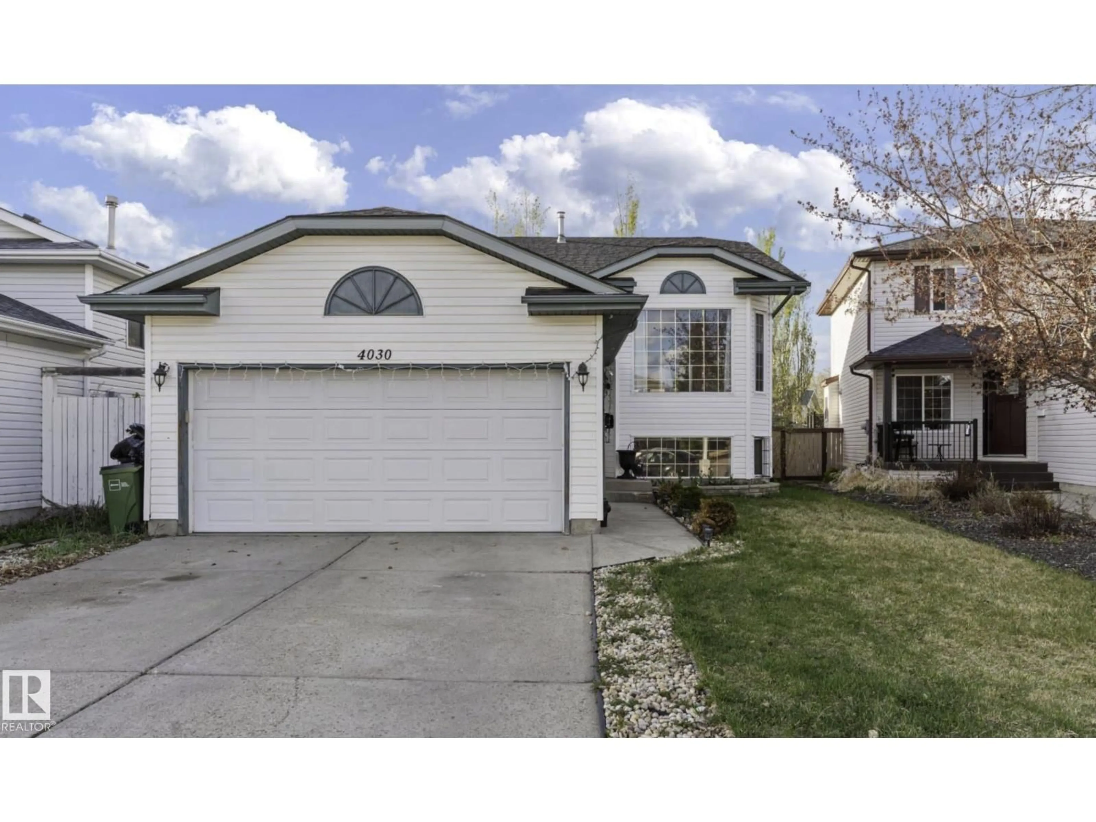 Home with vinyl exterior material, street for NW - 4030 37A AVENUE, Edmonton Alberta T6L7A1