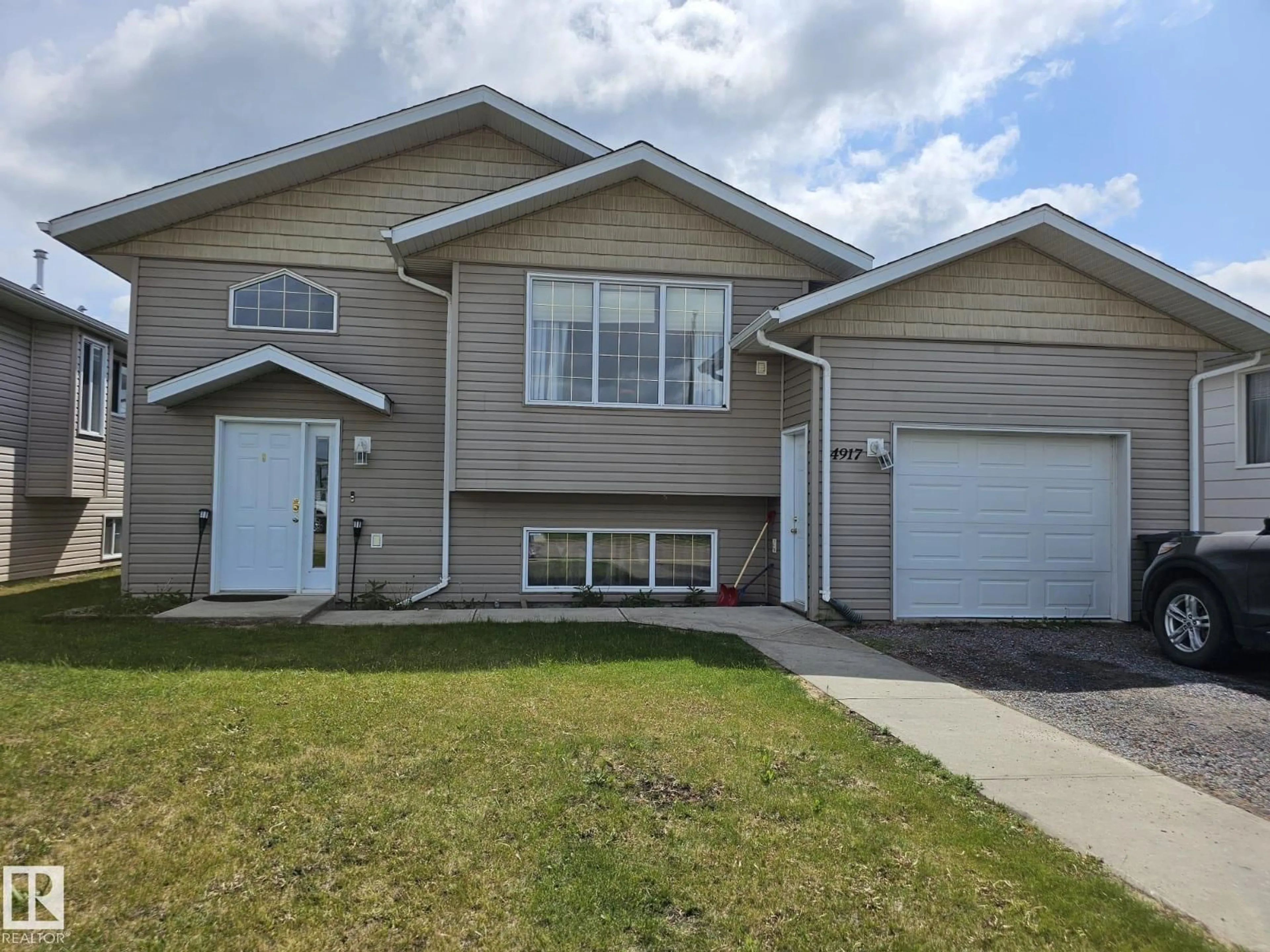 Home with vinyl exterior material, street for 4917 45 AV, St. Paul Town Alberta T0A3A4