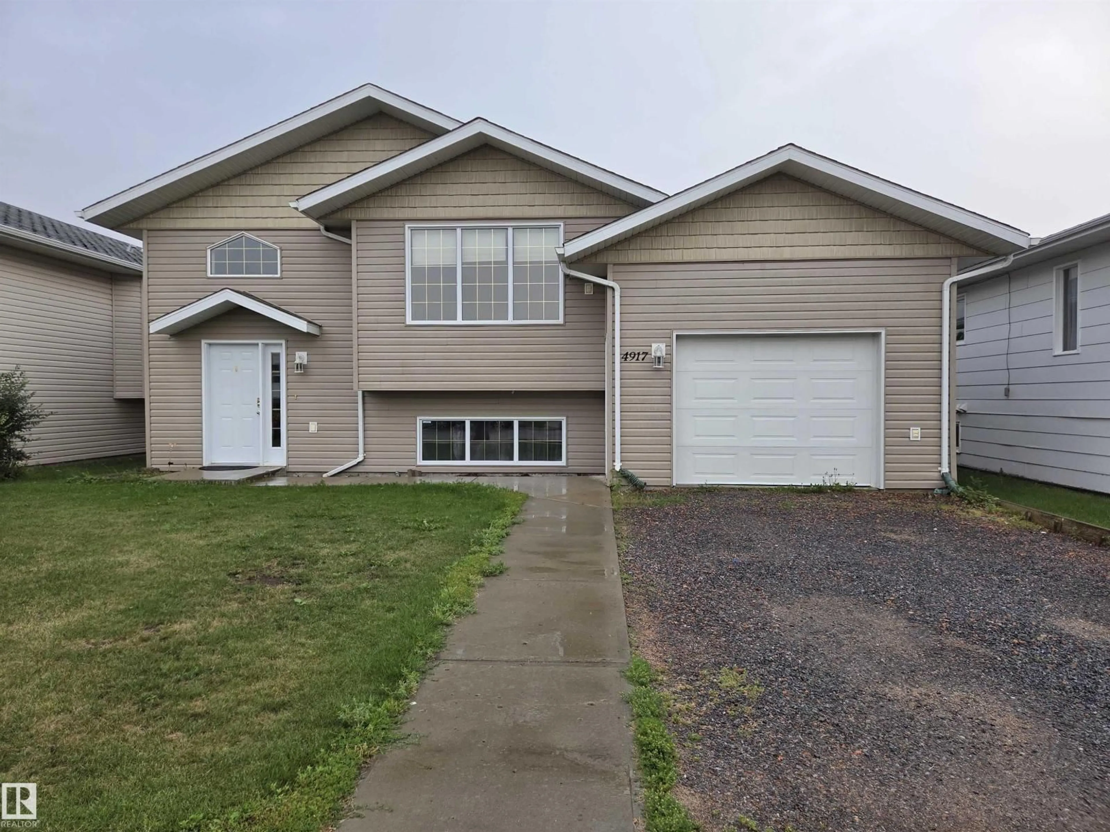 Home with vinyl exterior material, street for 4917 45 AV, St. Paul Town Alberta T0A3A4