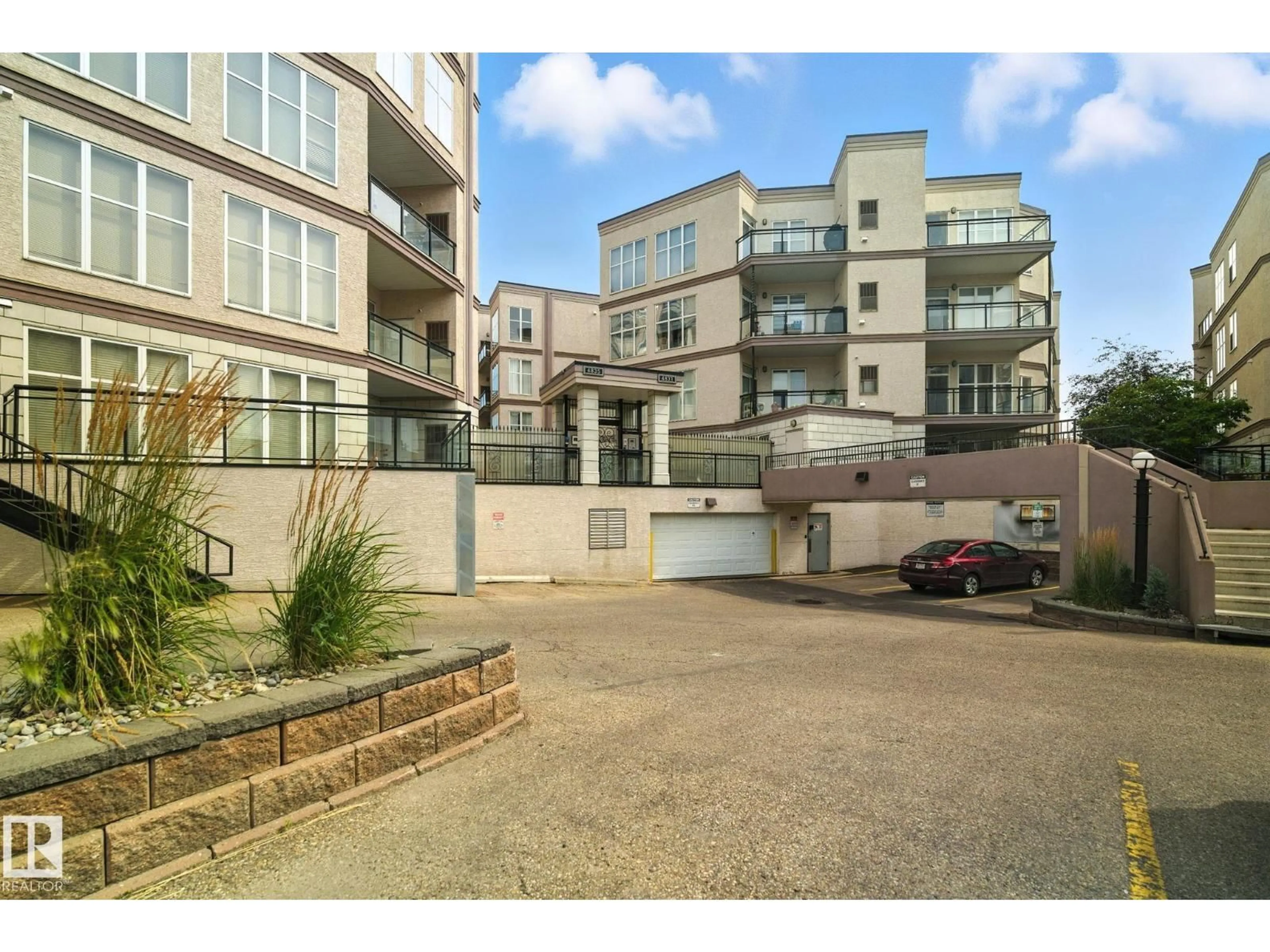 A pic from outside/outdoor area/front of a property/back of a property/a pic from drone, street for #410 - 4835 104A ST NW, Edmonton Alberta T6H0R5