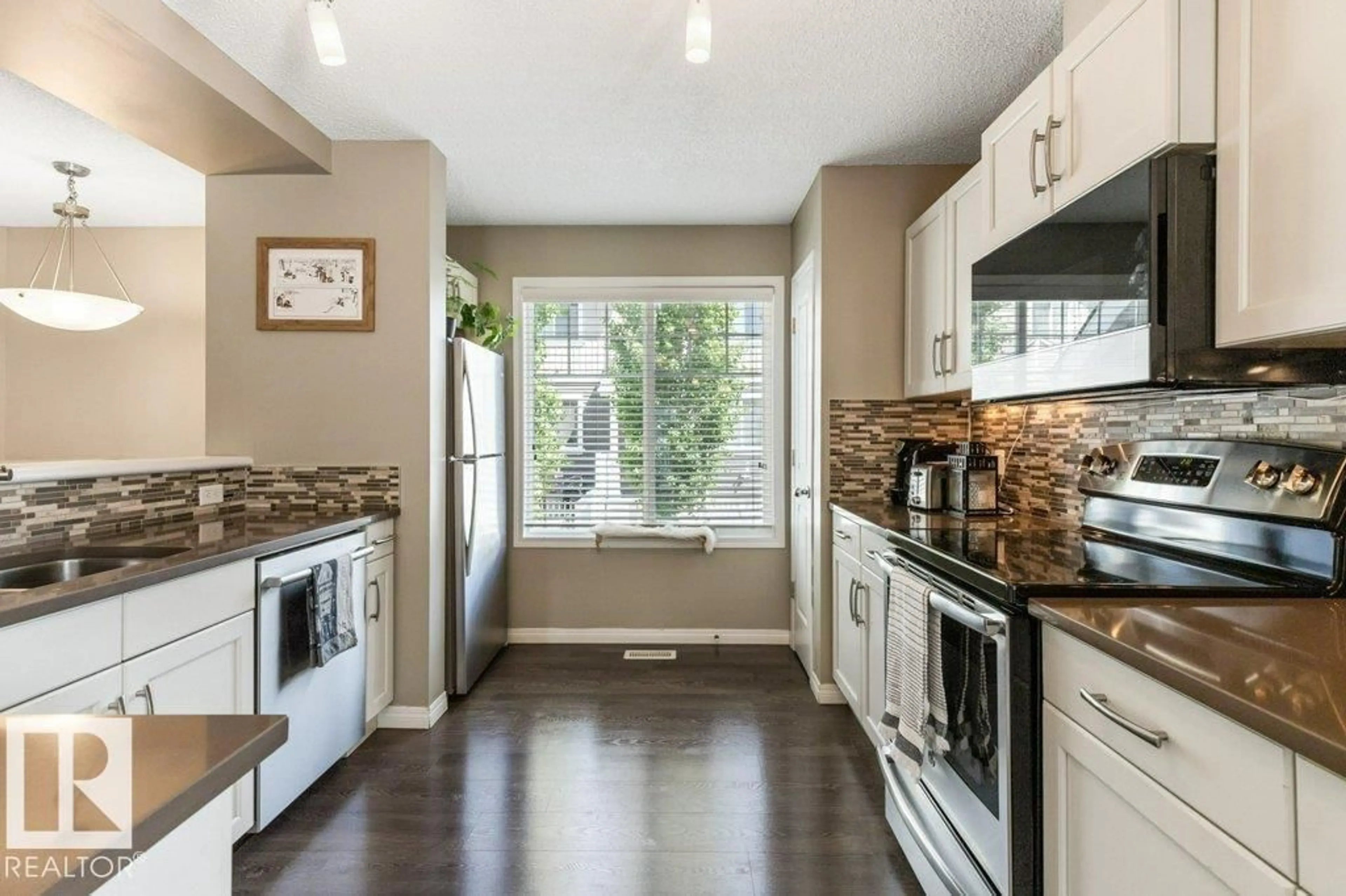Open concept kitchen, unknown for #78 - 4050 SAVARYN DR, Edmonton Alberta T6X1R8