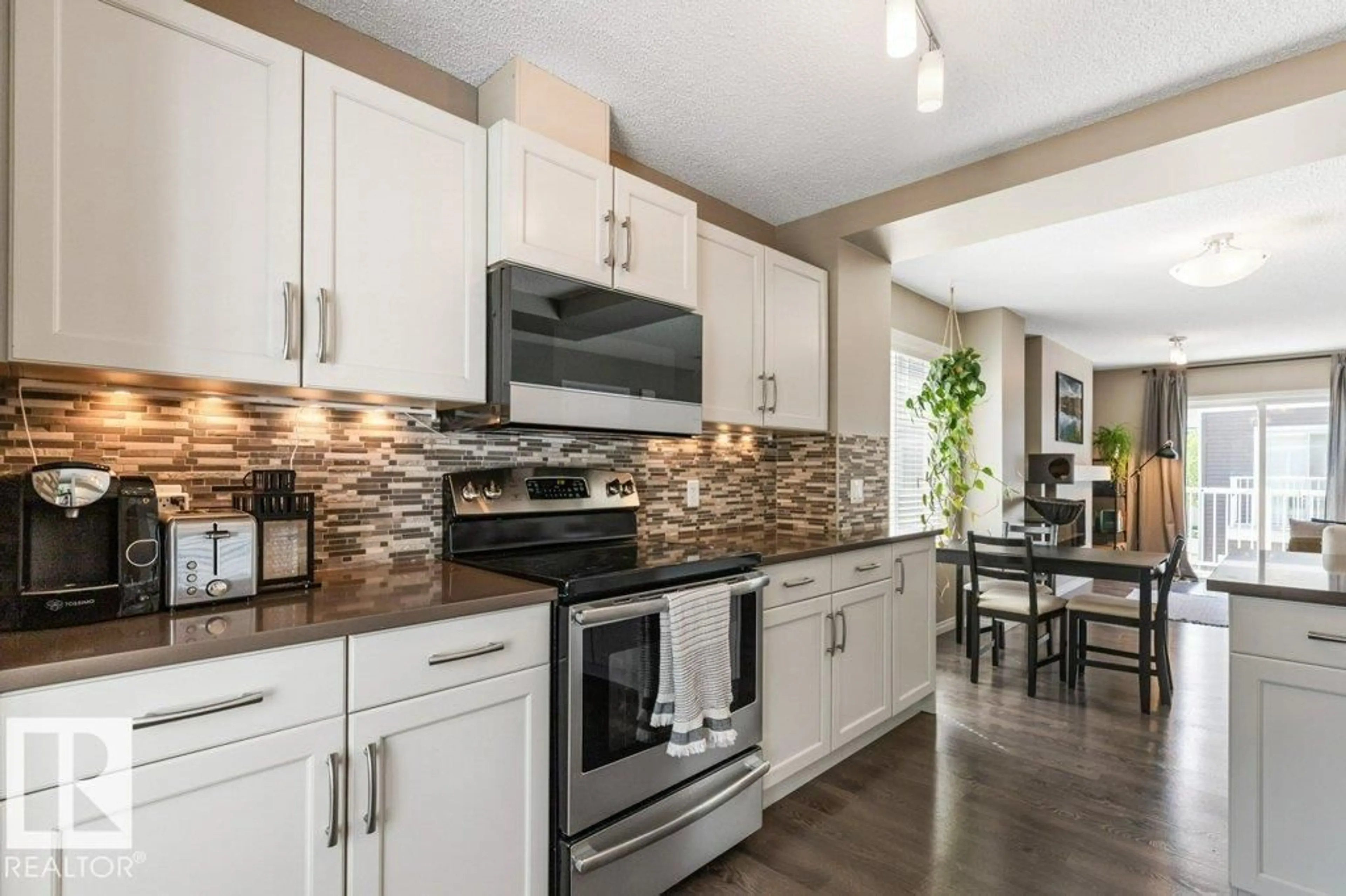 Open concept kitchen, ceramic/tile floor for #78 - 4050 SAVARYN DR, Edmonton Alberta T6X1R8
