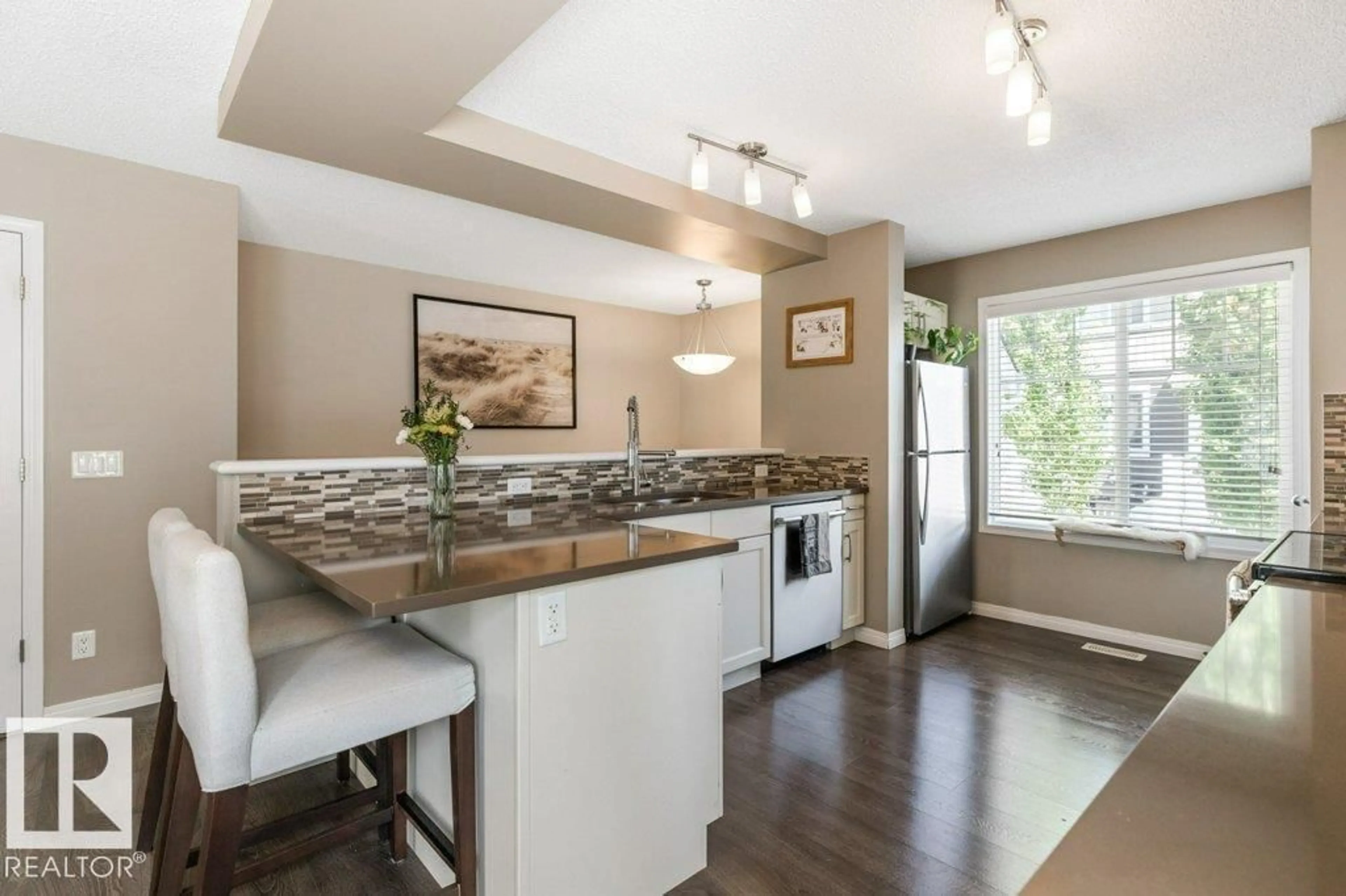 Open concept kitchen, unknown for #78 - 4050 SAVARYN DR, Edmonton Alberta T6X1R8