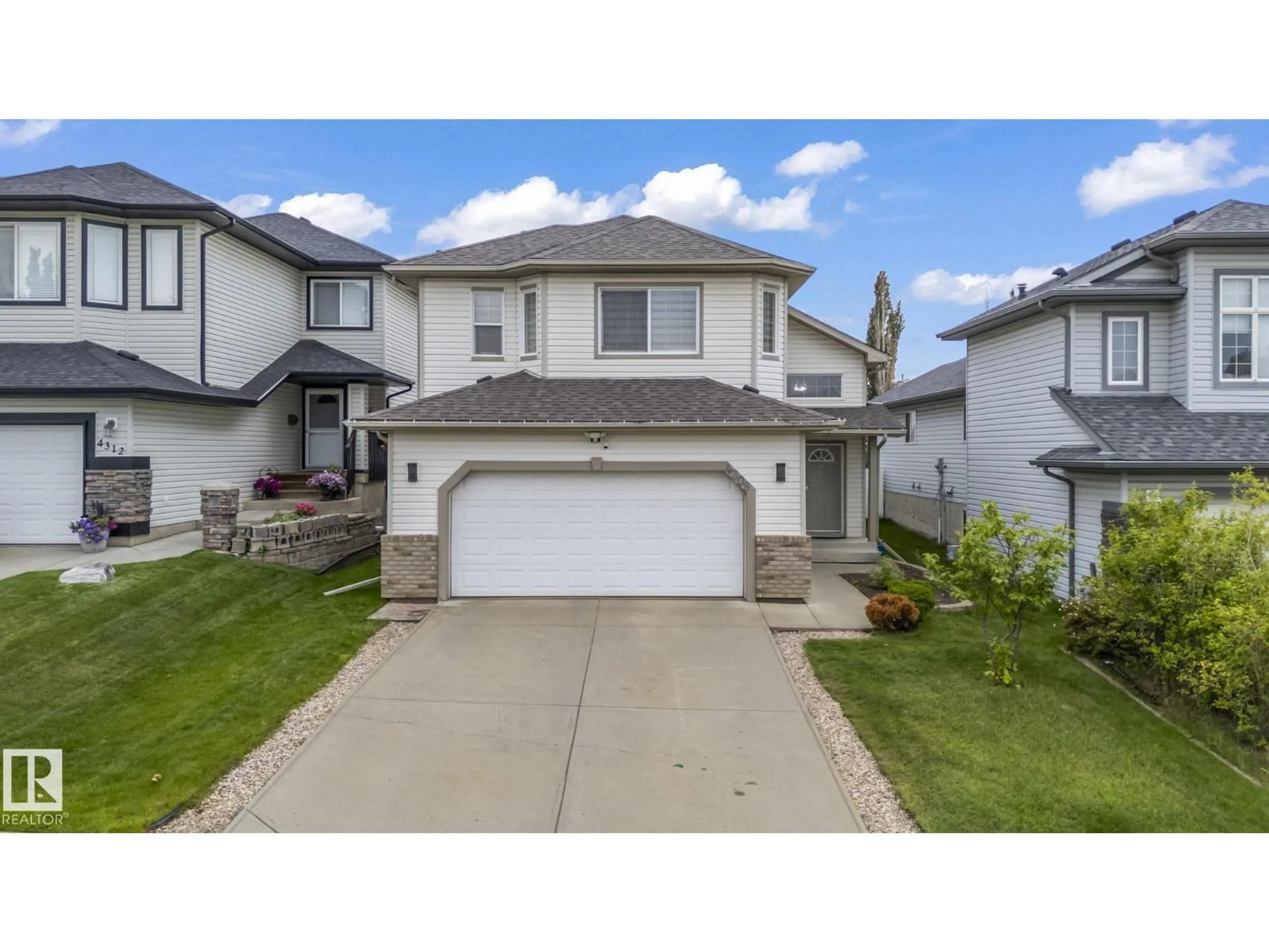 A pic from outside/outdoor area/front of a property/back of a property/a pic from drone, street for NW - 4308 155 AV, Edmonton Alberta T5Y3G9