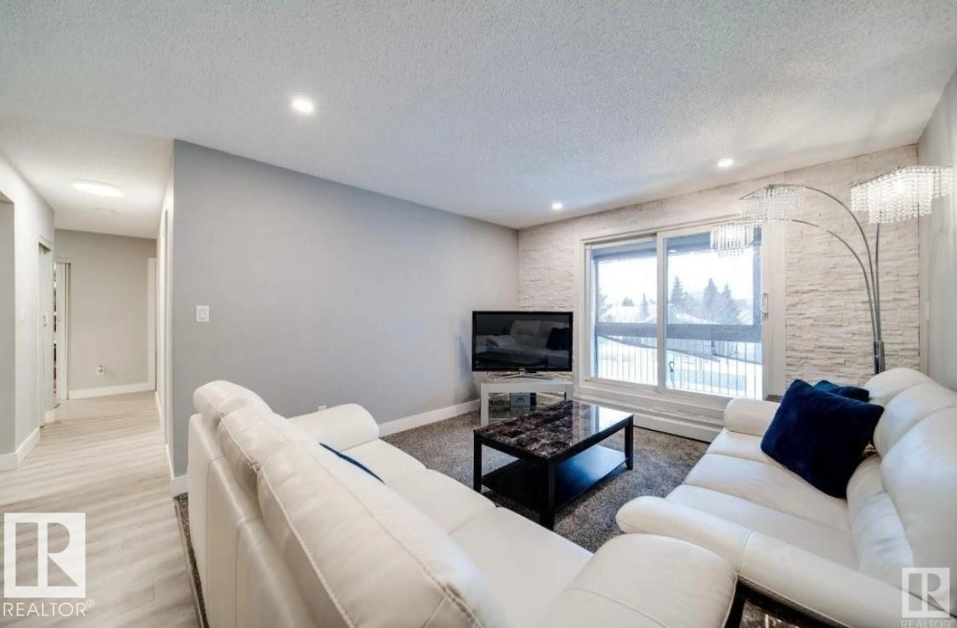 Living room with furniture, unknown for 301 - 4810 MILL WOODS S, Edmonton Alberta T6L5N9