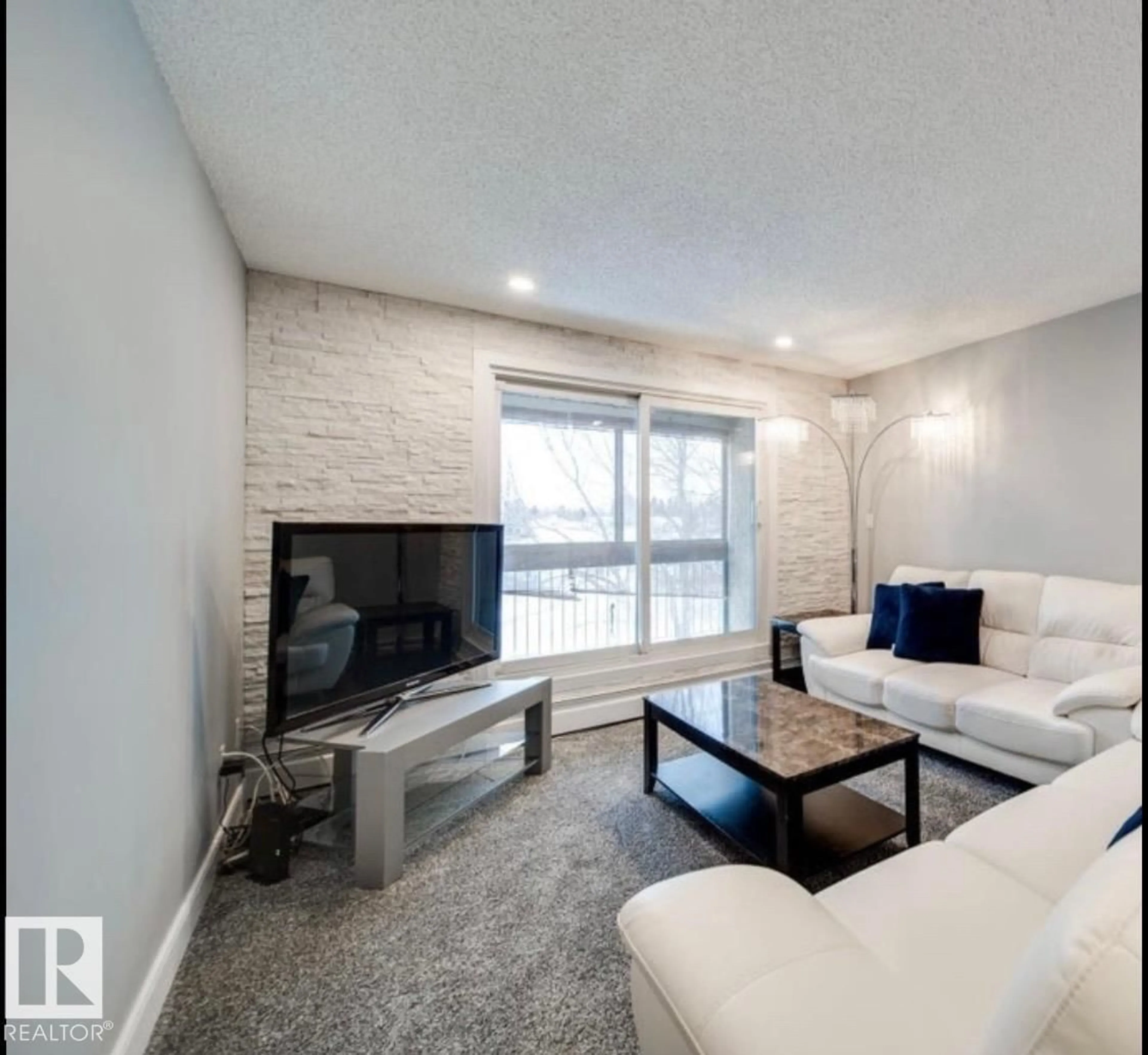 Living room with furniture, unknown for 301 - 4810 MILL WOODS S, Edmonton Alberta T6L5N9