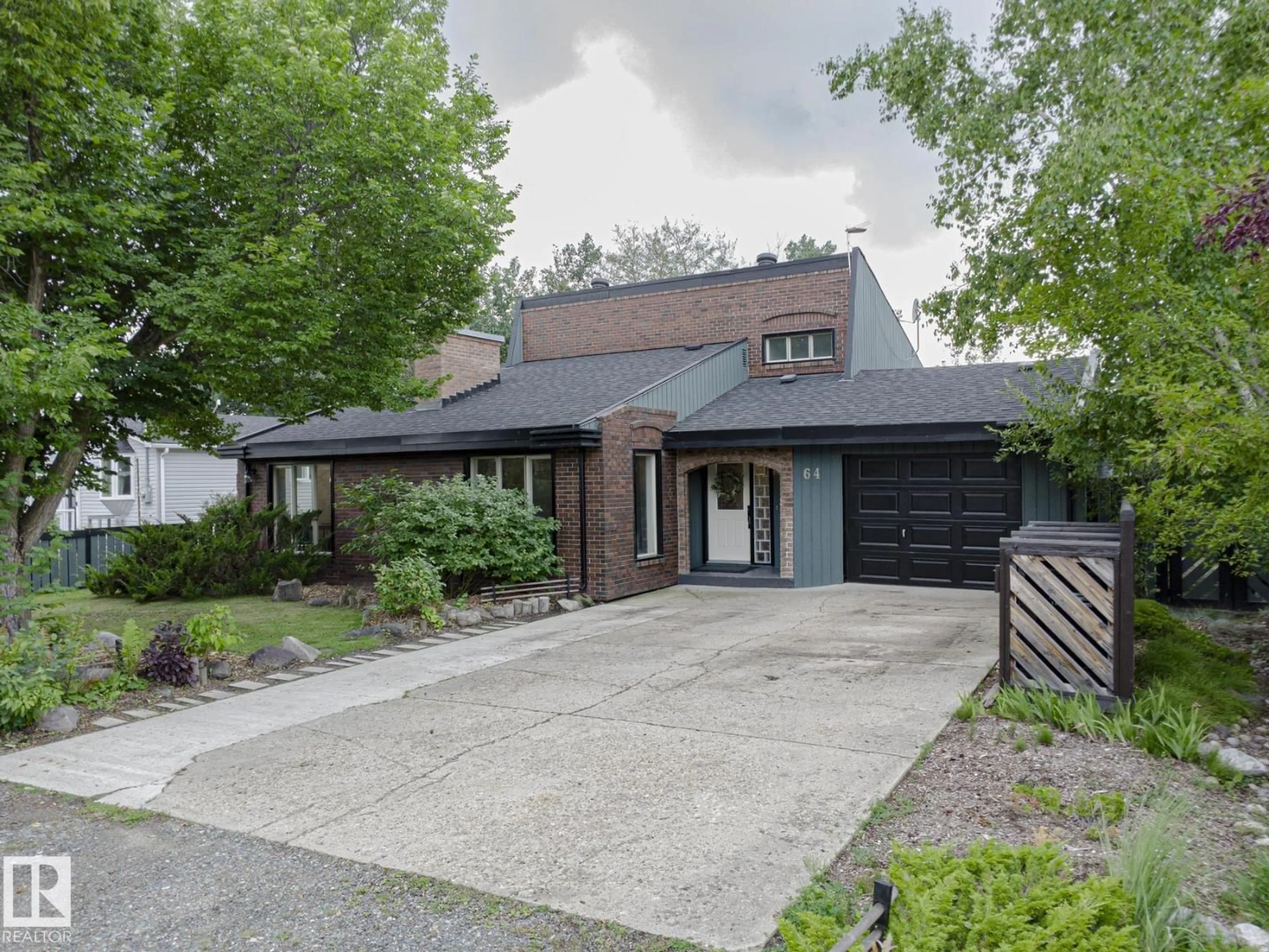 Home with brick exterior material, street for 51551 - 64 RGE RD 212 A, Rural Strathcona County Alberta T8G1B1