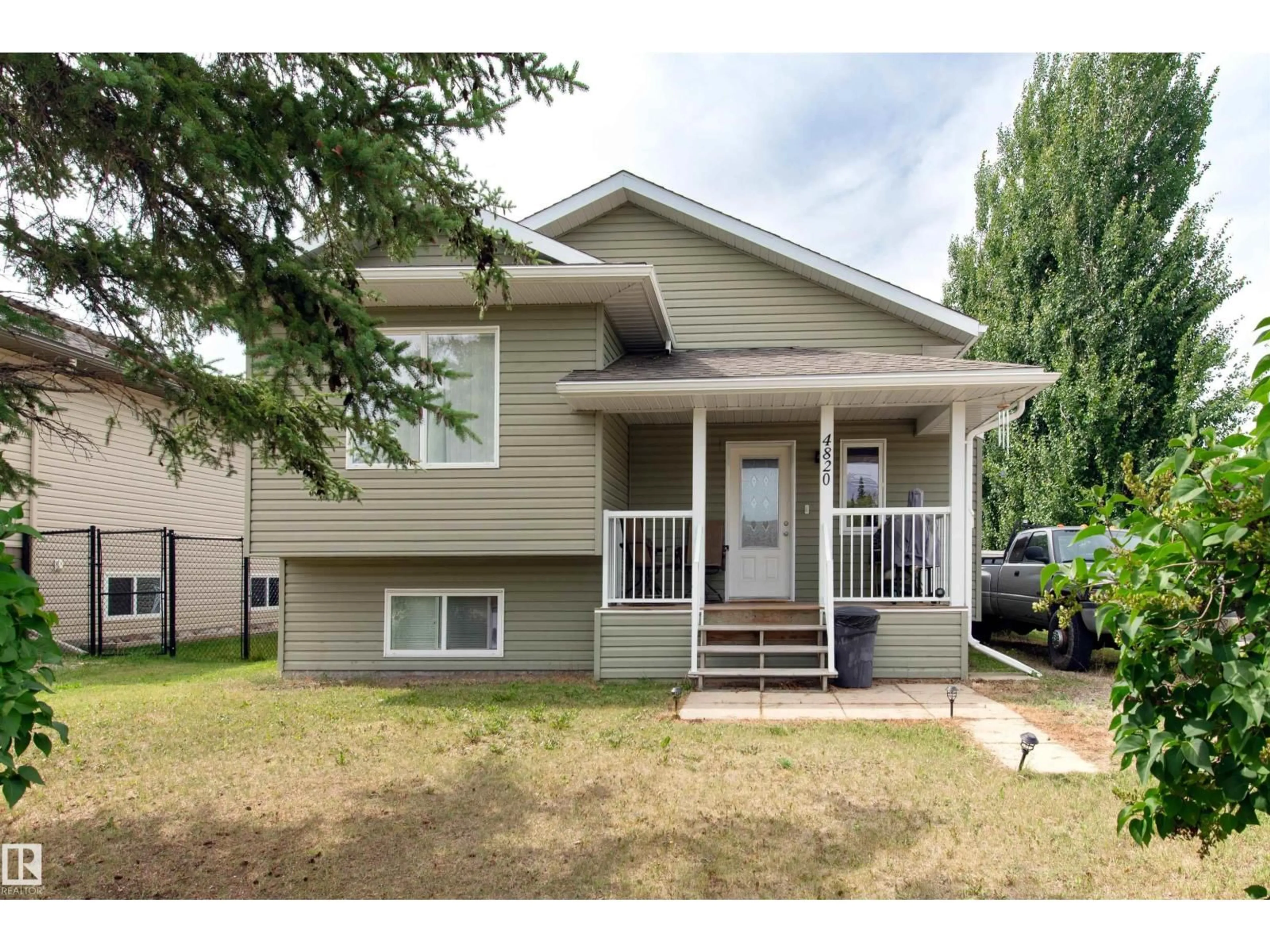 Home with vinyl exterior material, street for 4820 51 ST, Ardmore Alberta T0A1H0