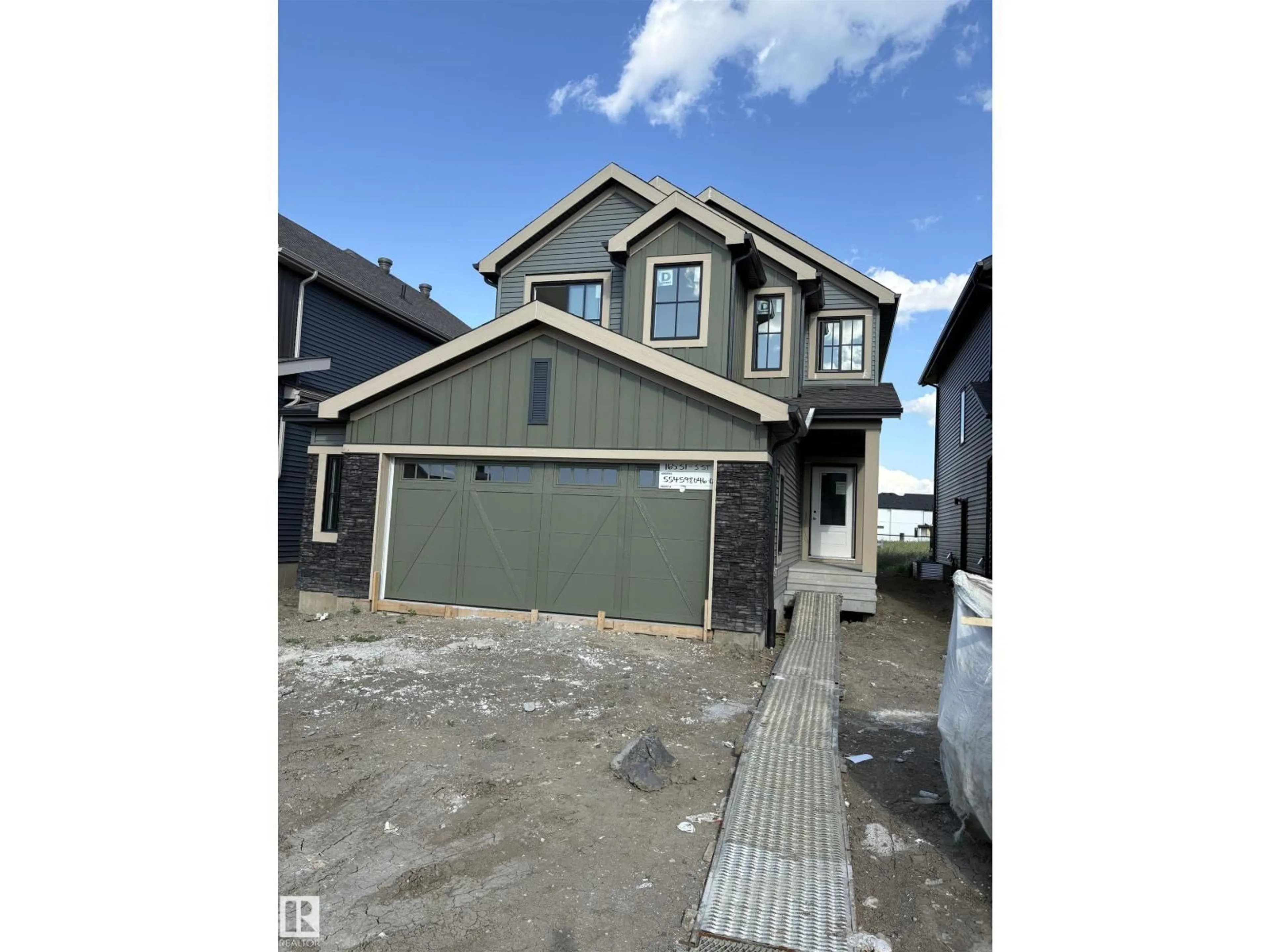 Home with vinyl exterior material, street for NE - 16531 3 ST, Edmonton Alberta T5Y4E9