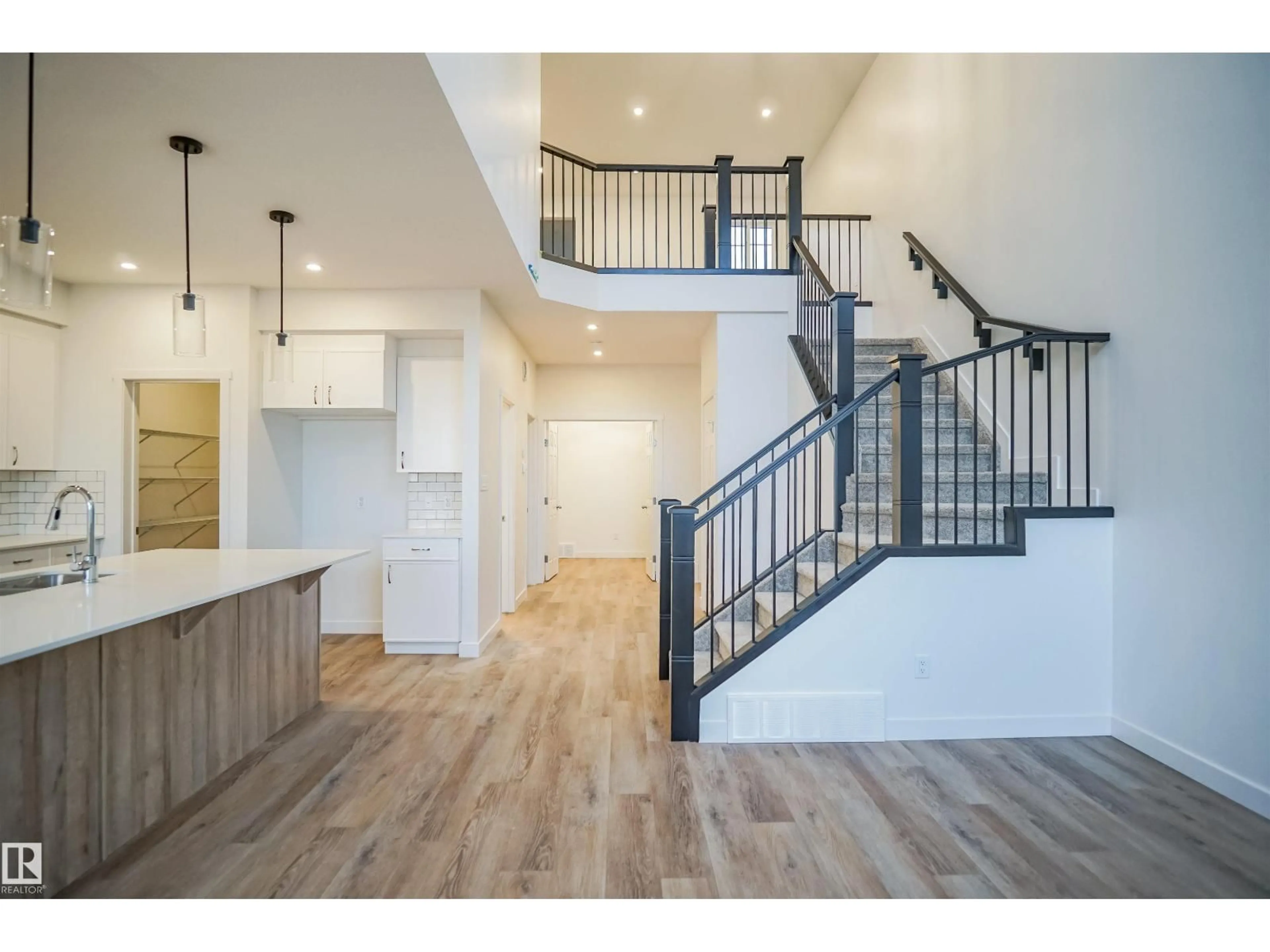 Indoor entryway for 1323 11 AV, Edmonton Alberta T6W4X8