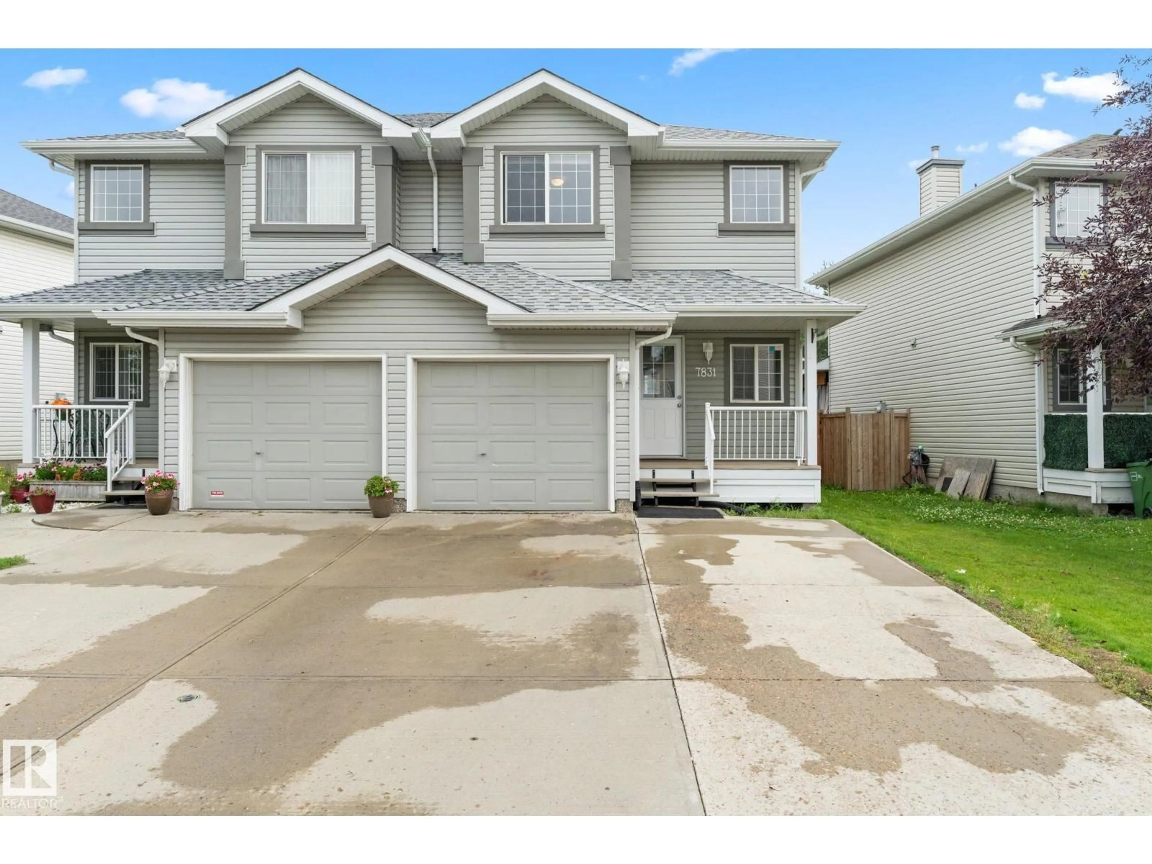 Home with vinyl exterior material, street for 7831 8 AV, Edmonton Alberta T6X0A4