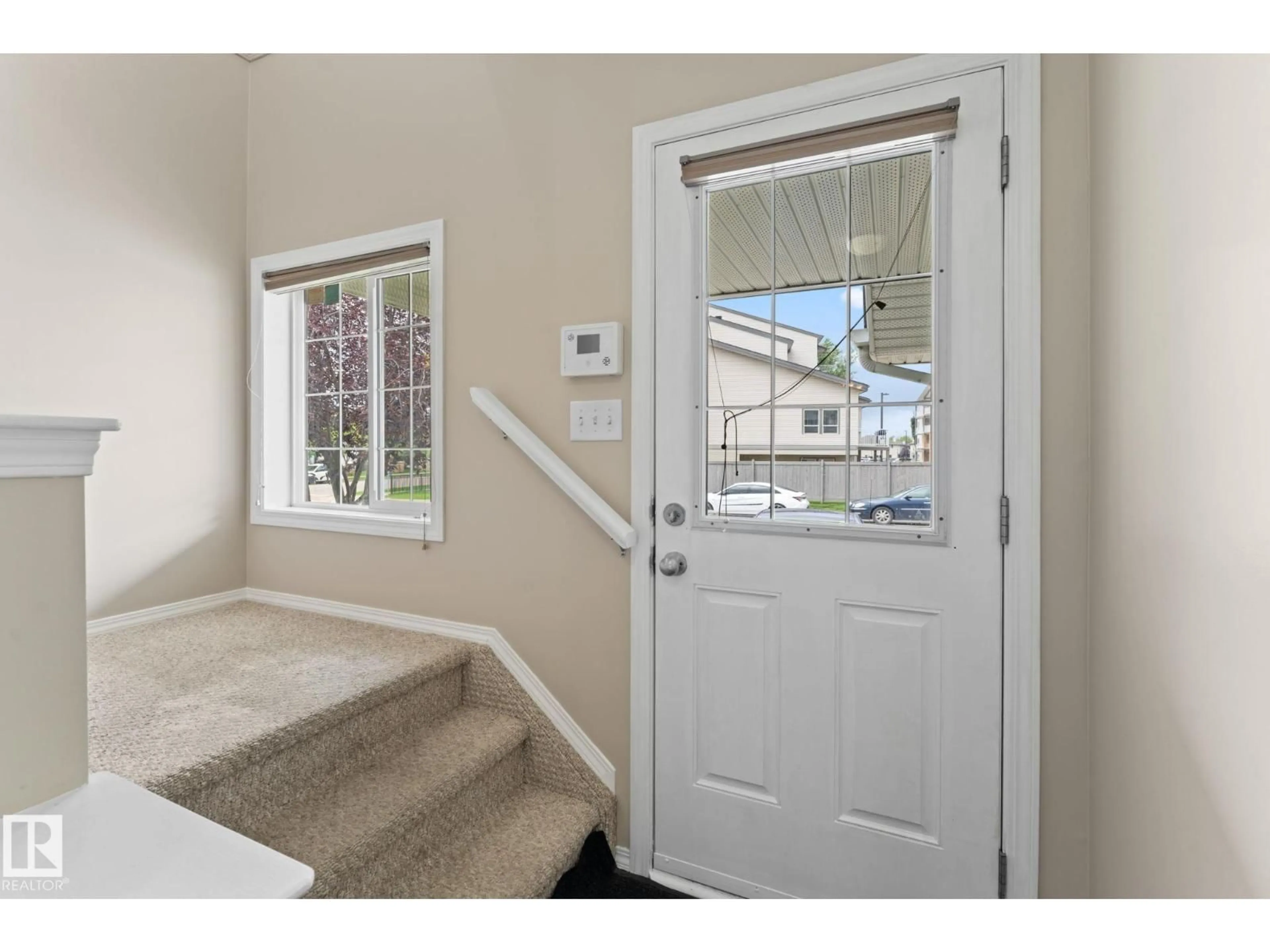 Indoor entryway for 7831 8 AV, Edmonton Alberta T6X0A4