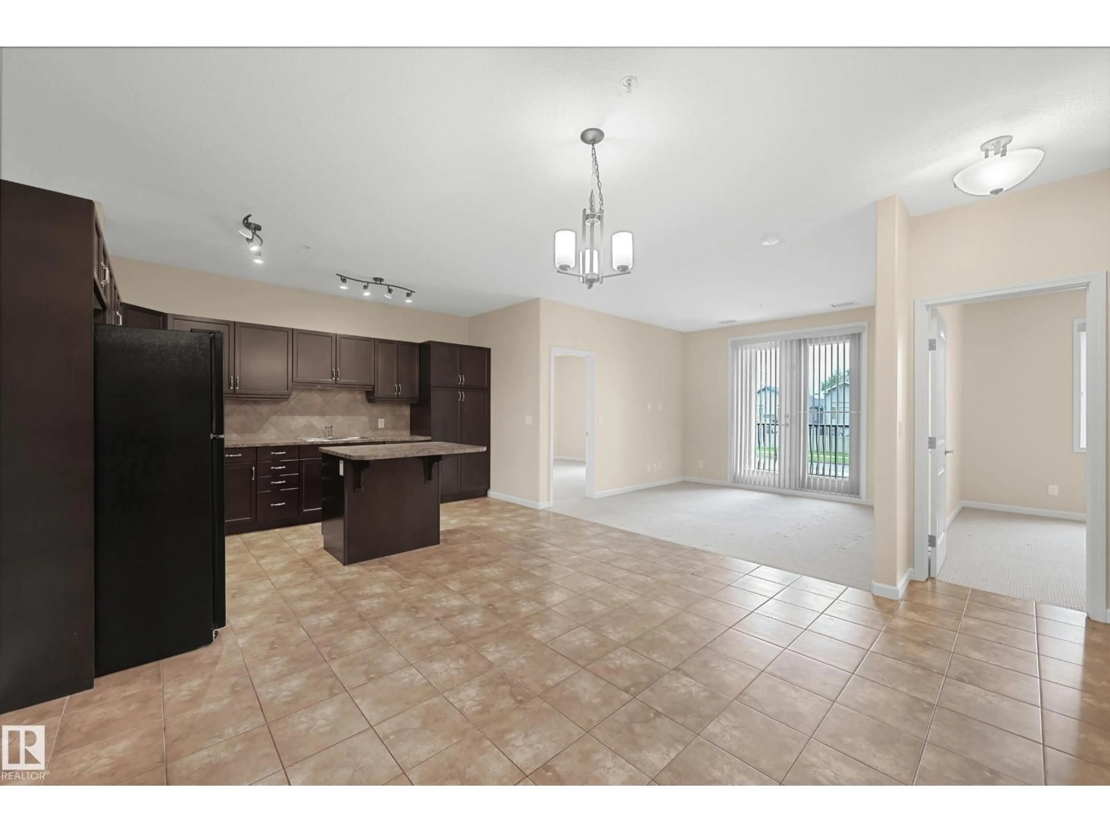 Open concept kitchen, ceramic/tile floor for #216 - 6083 MAYNARD WY, Edmonton Alberta T6R0S5