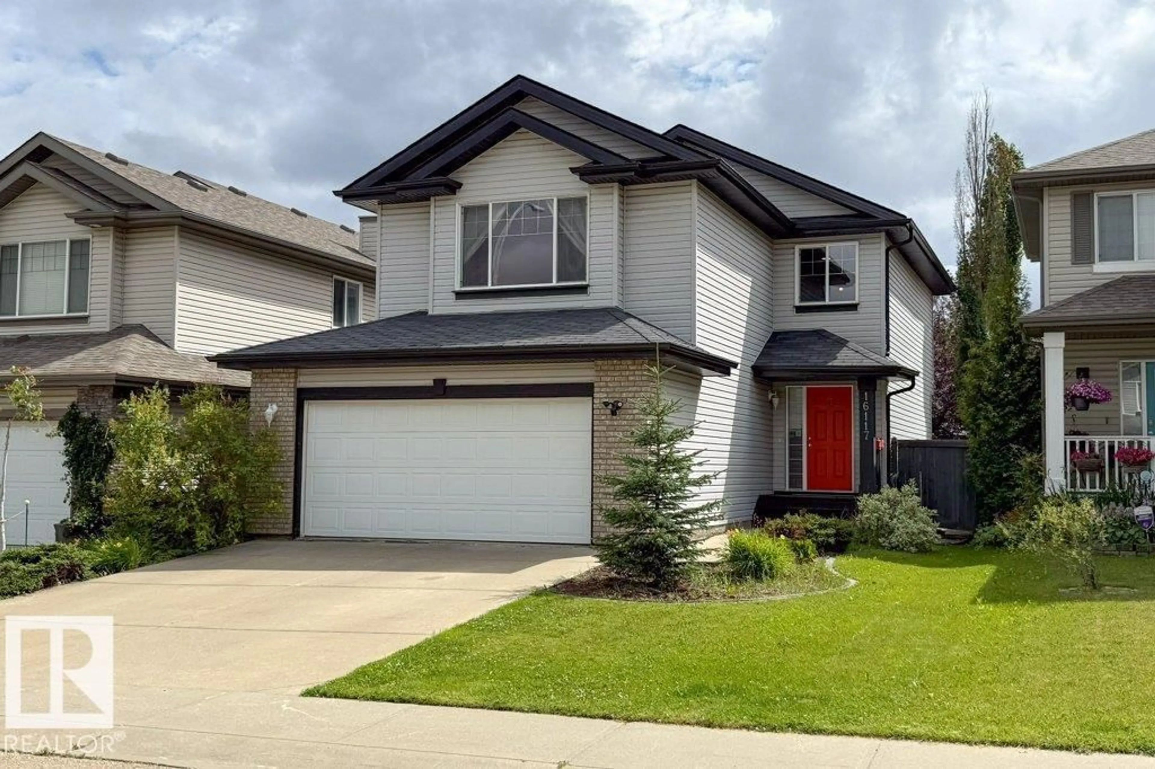 Home with vinyl exterior material, street for 16117 49 ST, Edmonton Alberta T5Y3H5