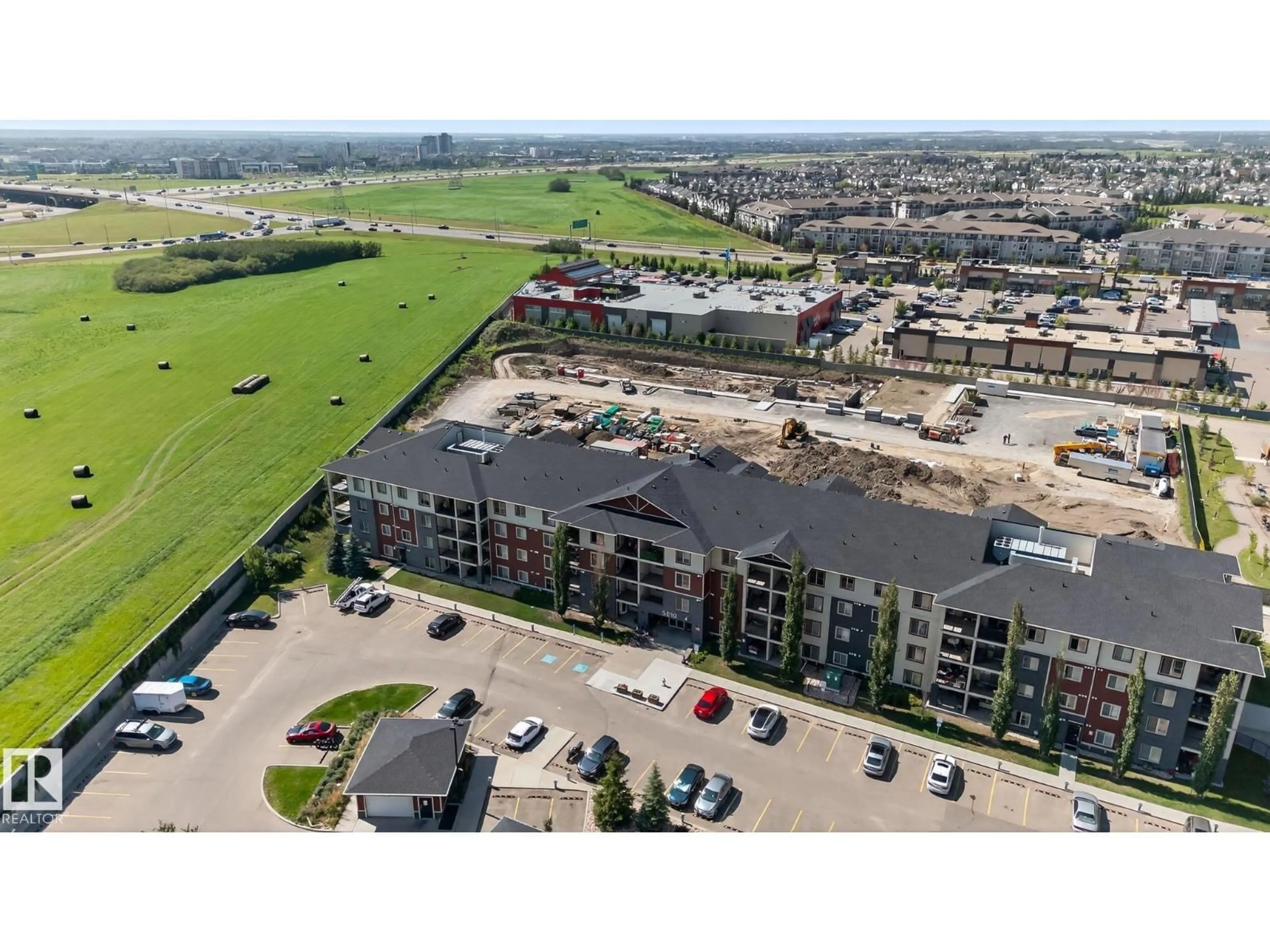 A pic from outside/outdoor area/front of a property/back of a property/a pic from drone, unknown for #208 - 5810 MULLEN PL, Edmonton Alberta T6R0W3