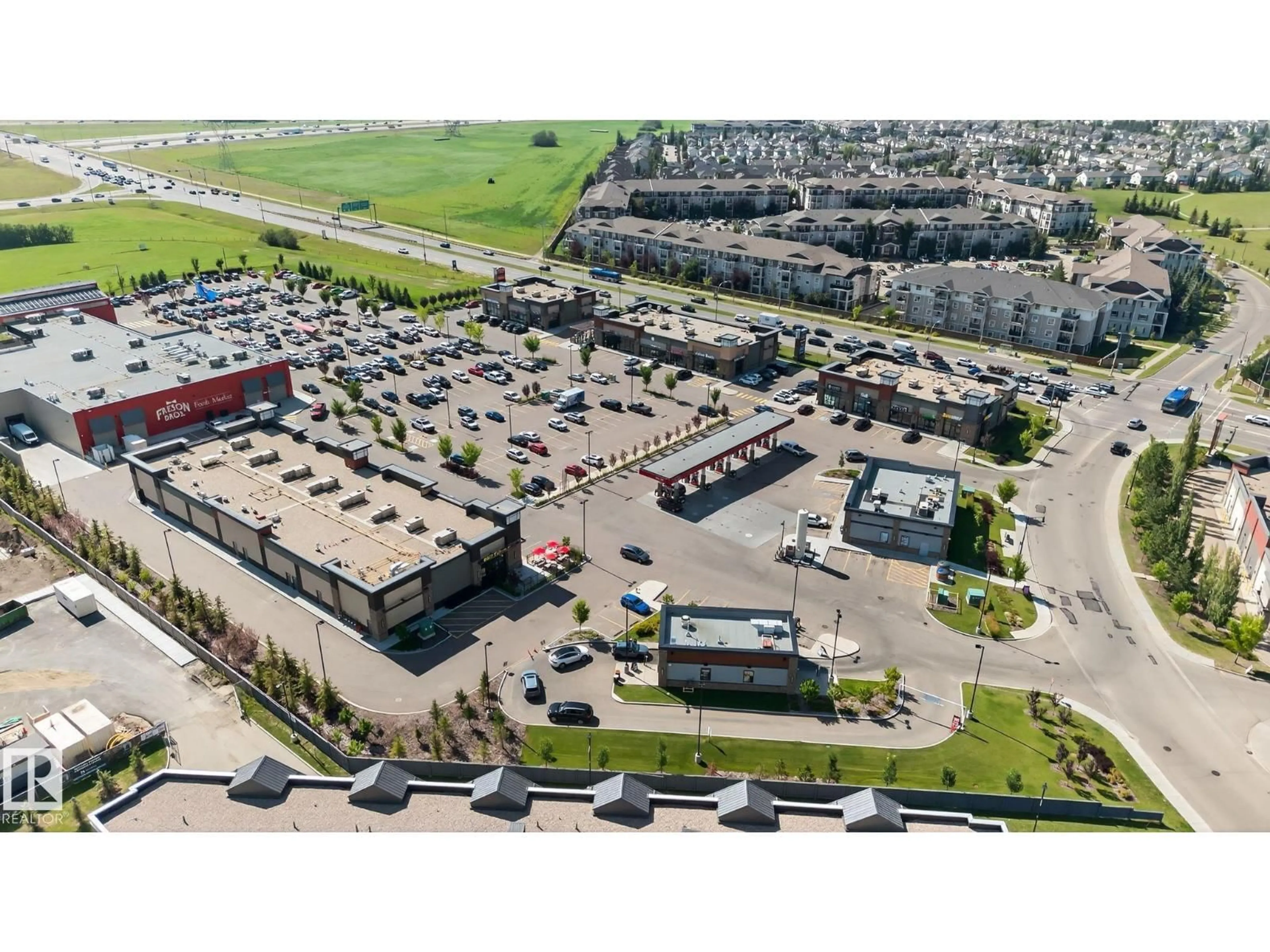 A pic from outside/outdoor area/front of a property/back of a property/a pic from drone, street for #208 - 5810 MULLEN PL, Edmonton Alberta T6R0W3