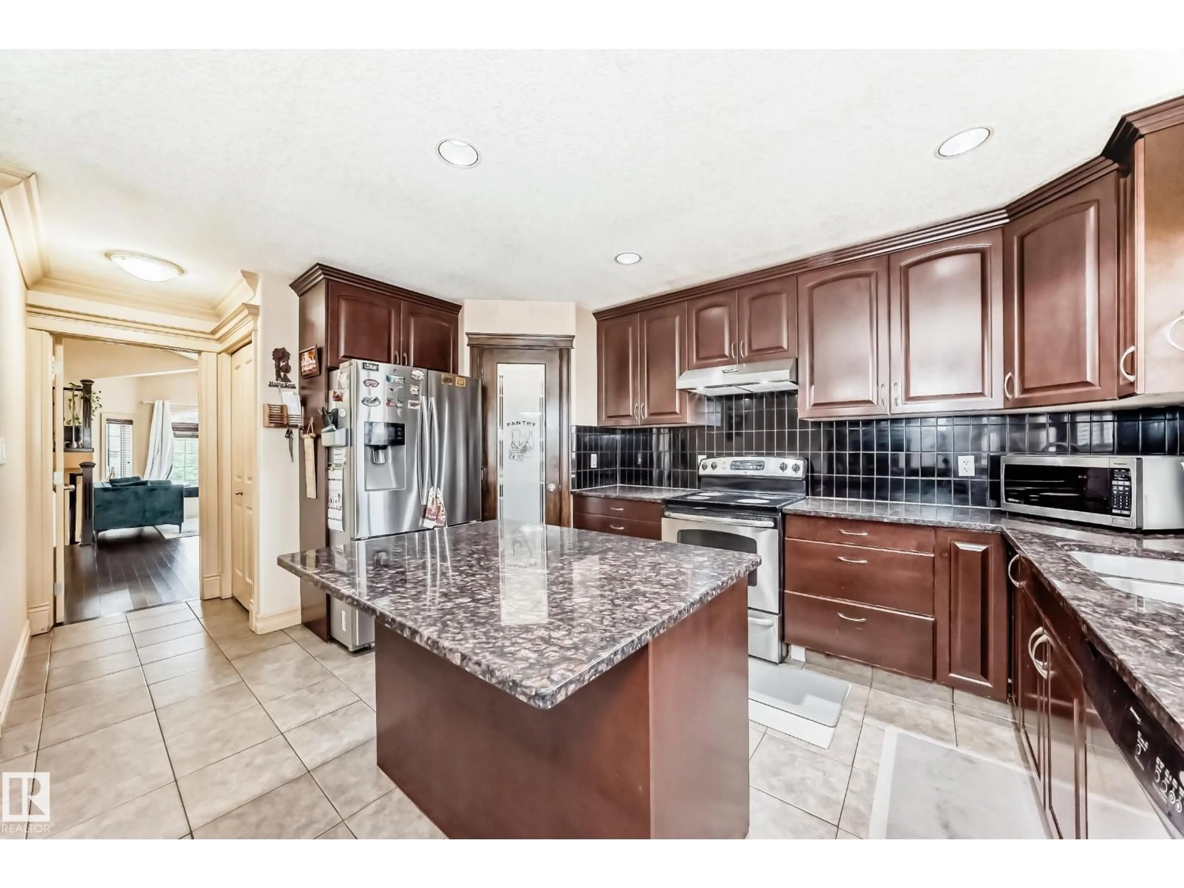 Open concept kitchen, ceramic/tile floor for 1913 33B AV, Edmonton Alberta T6T0H4