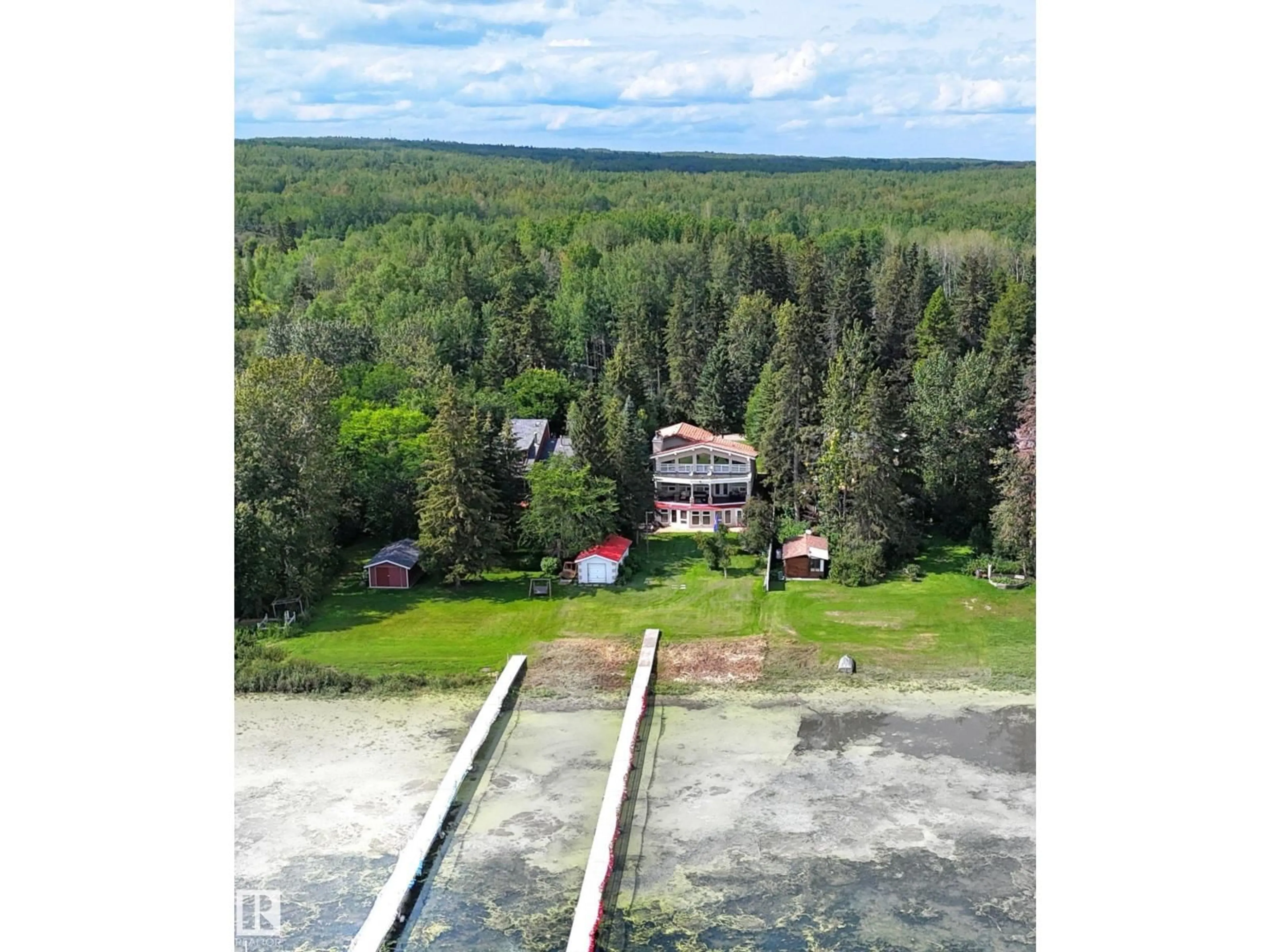 A pic from outside/outdoor area/front of a property/back of a property/a pic from drone, unknown for 2001 - 110 TWP474 MITCHELL BEACH, Rural Leduc County Alberta T0C2P0