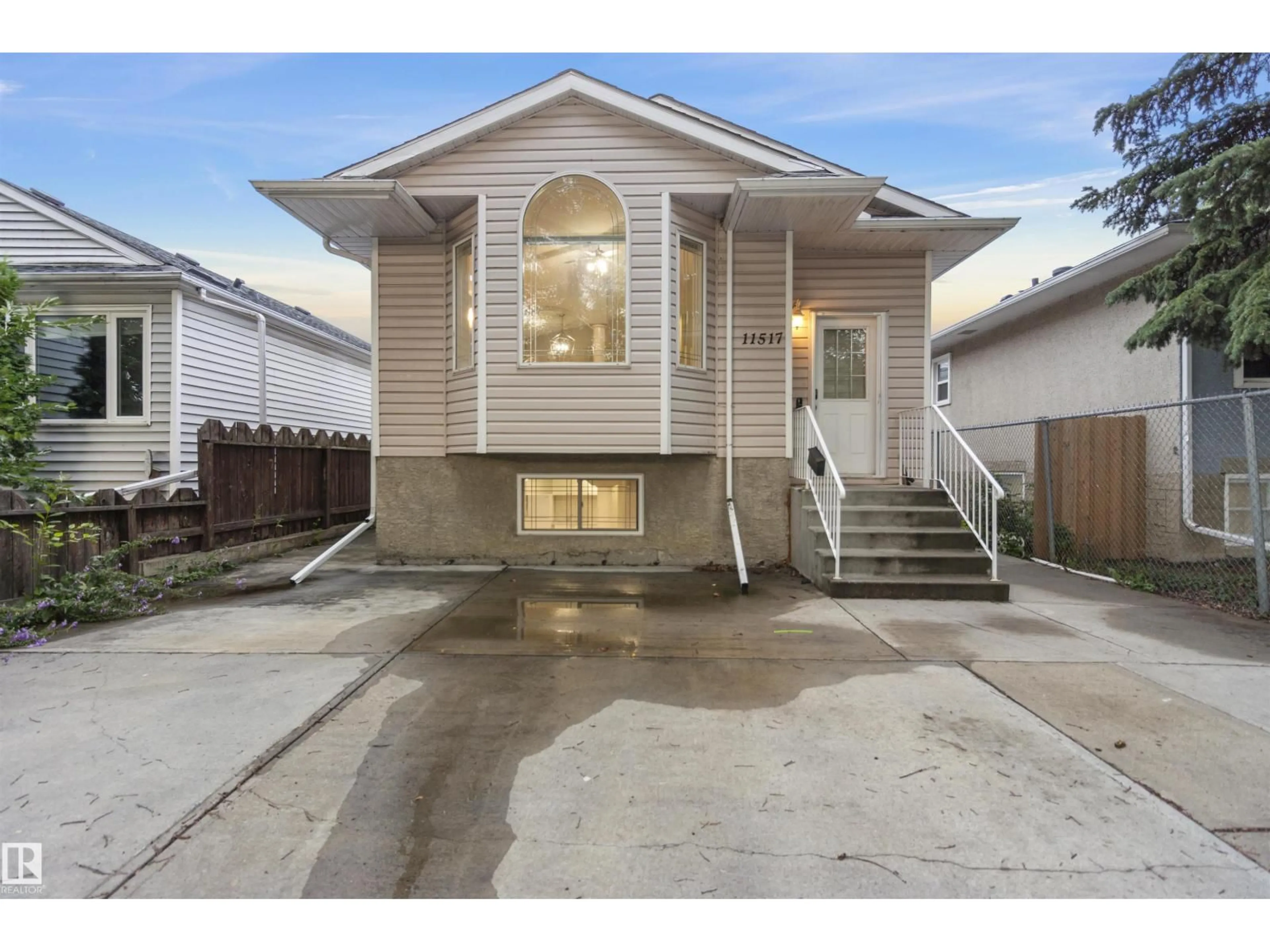 Home with vinyl exterior material, street for NW - 11517 83 ST, Edmonton Alberta T5B2Y6
