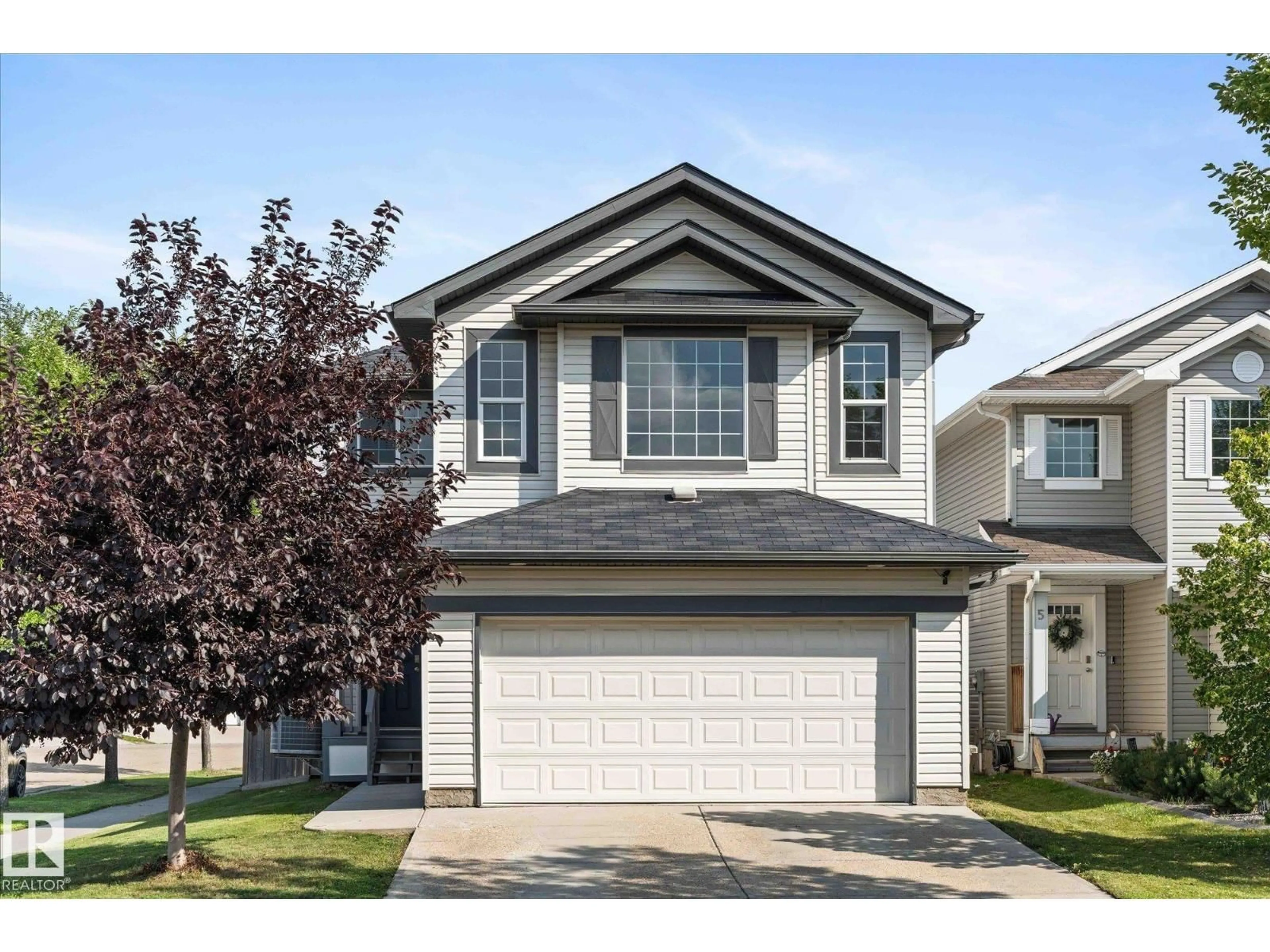 Home with vinyl exterior material, street for 1 RIDGELAND WY, Fort Saskatchewan Alberta T8L0E7