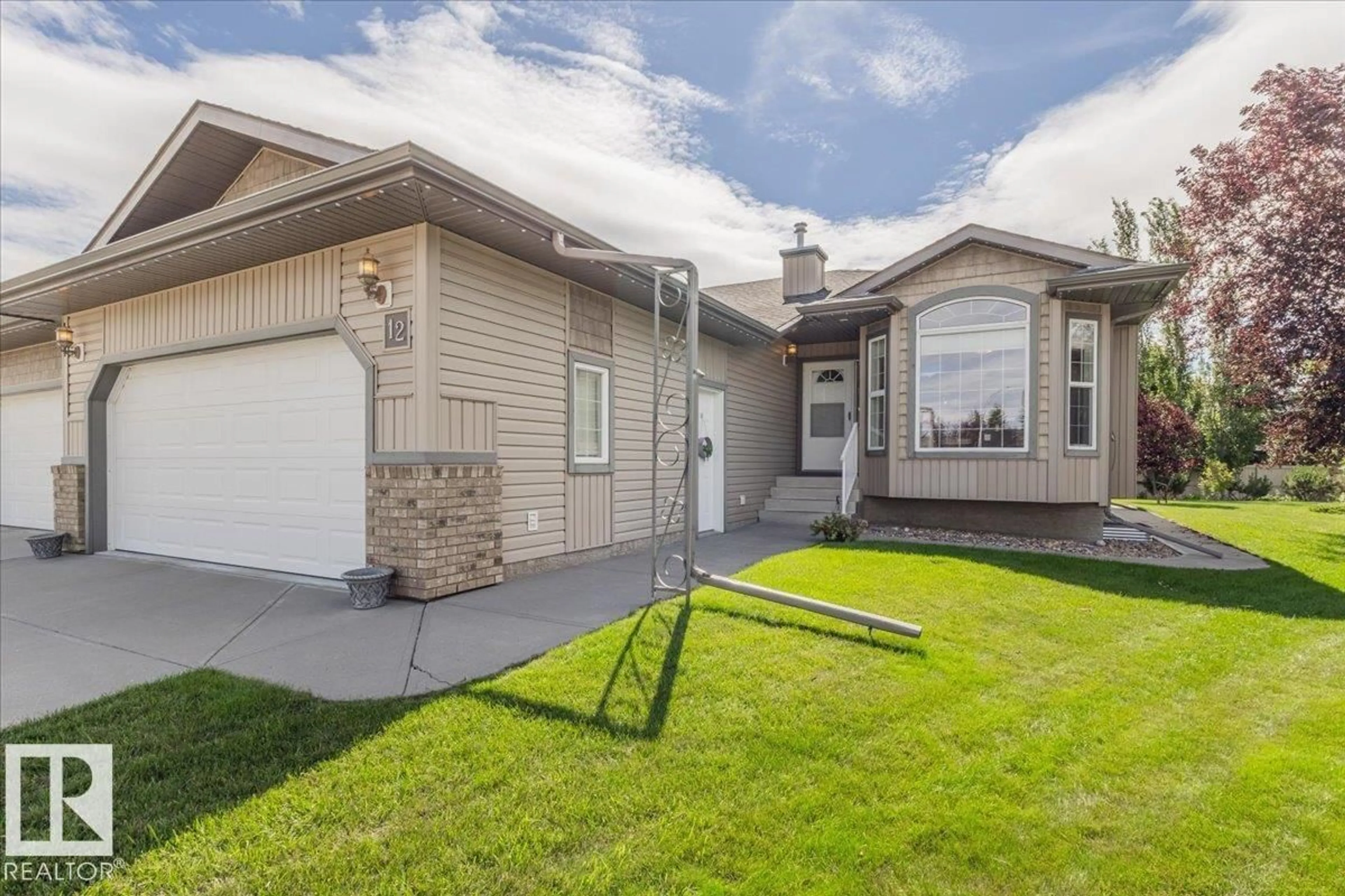 Home with vinyl exterior material, street for 12 NORDAL CL, Wetaskiwin Alberta T9A0P1