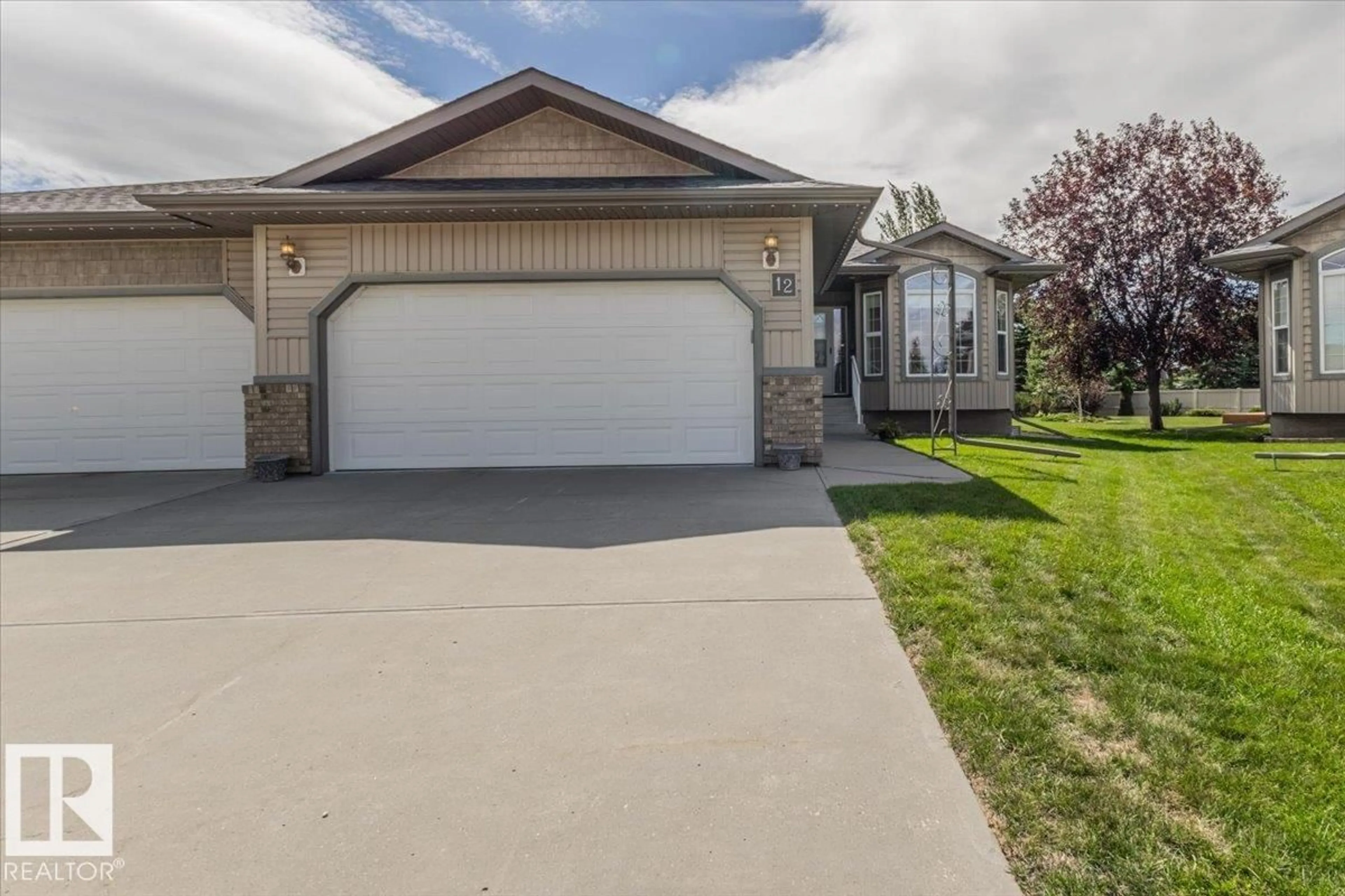 Home with vinyl exterior material, street for 12 NORDAL CL, Wetaskiwin Alberta T9A0P1
