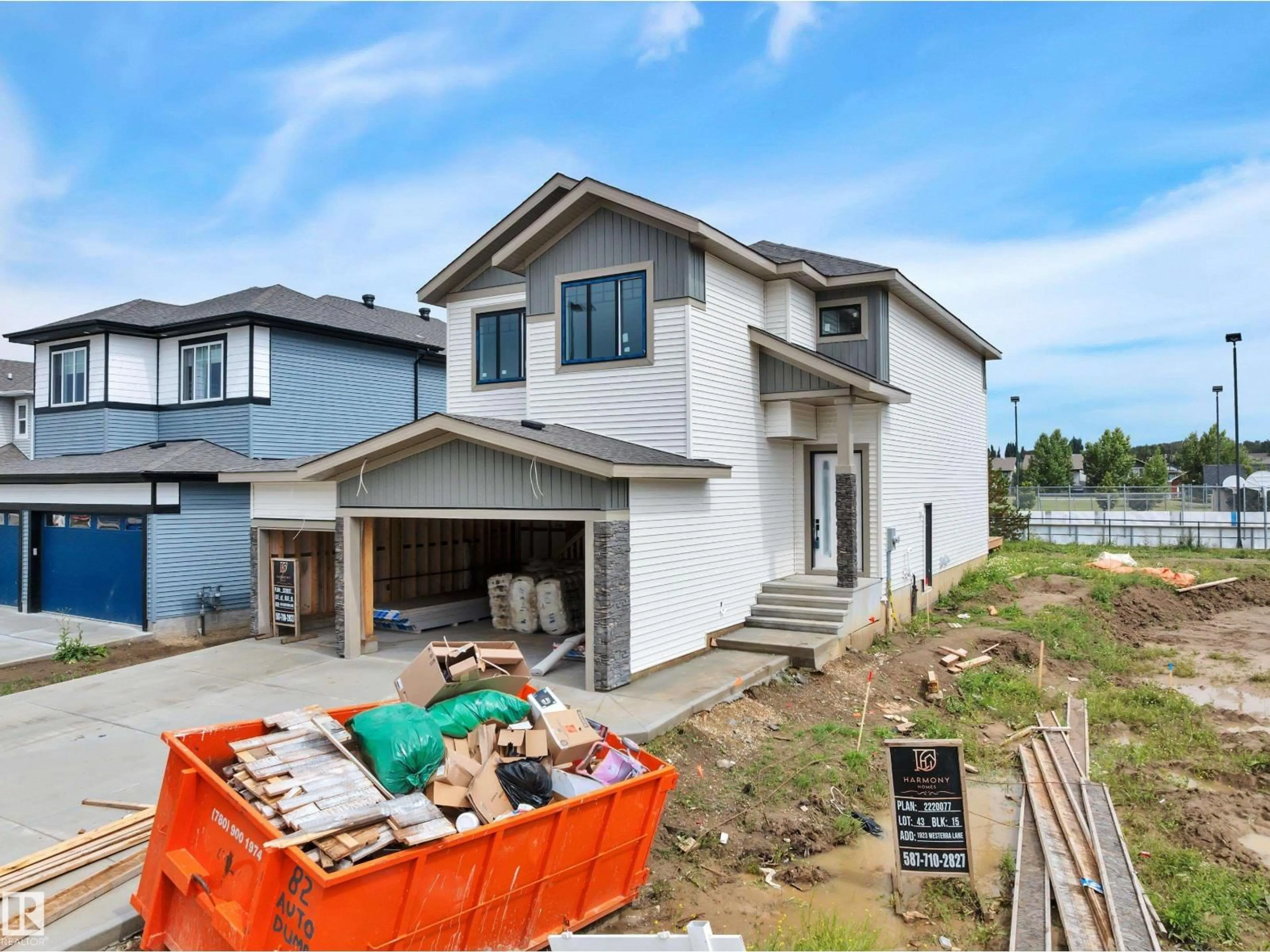 Home with vinyl exterior material, street for 1925 WESTERRA LN, Stony Plain Alberta T7Z0L3